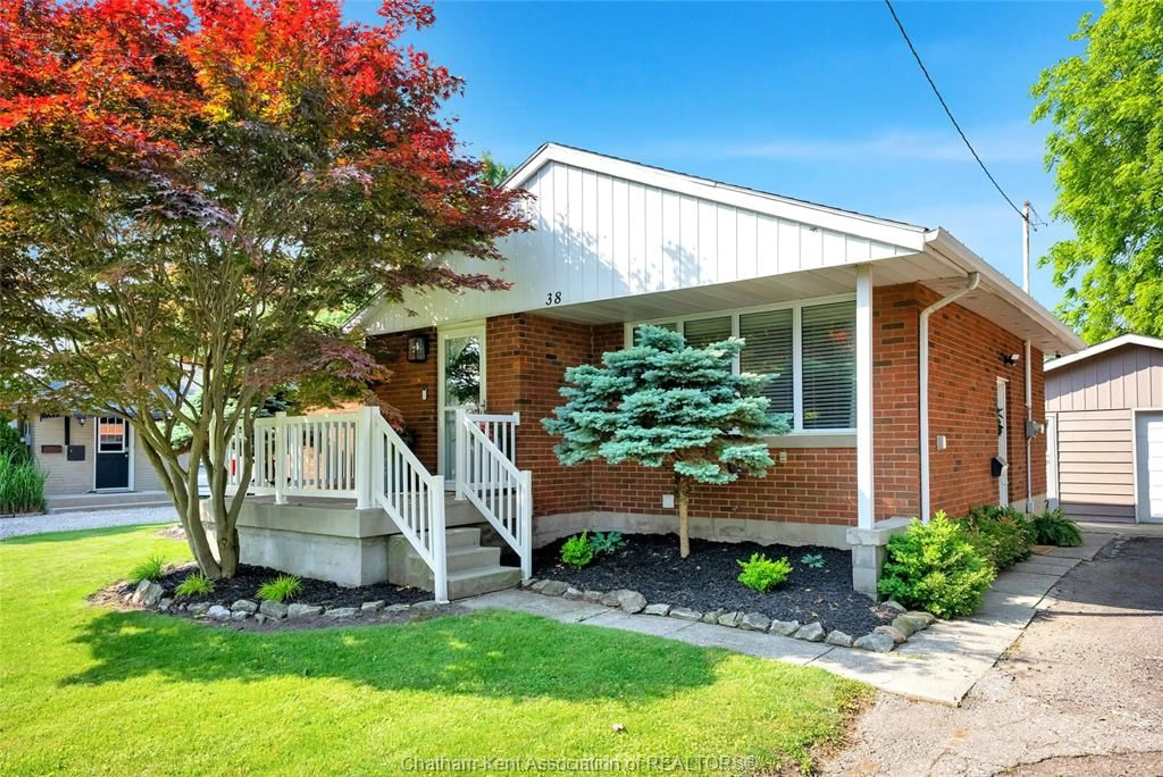 Home with brick exterior material, street for 38 Burton Ave, Chatham Ontario N7M 4Z5