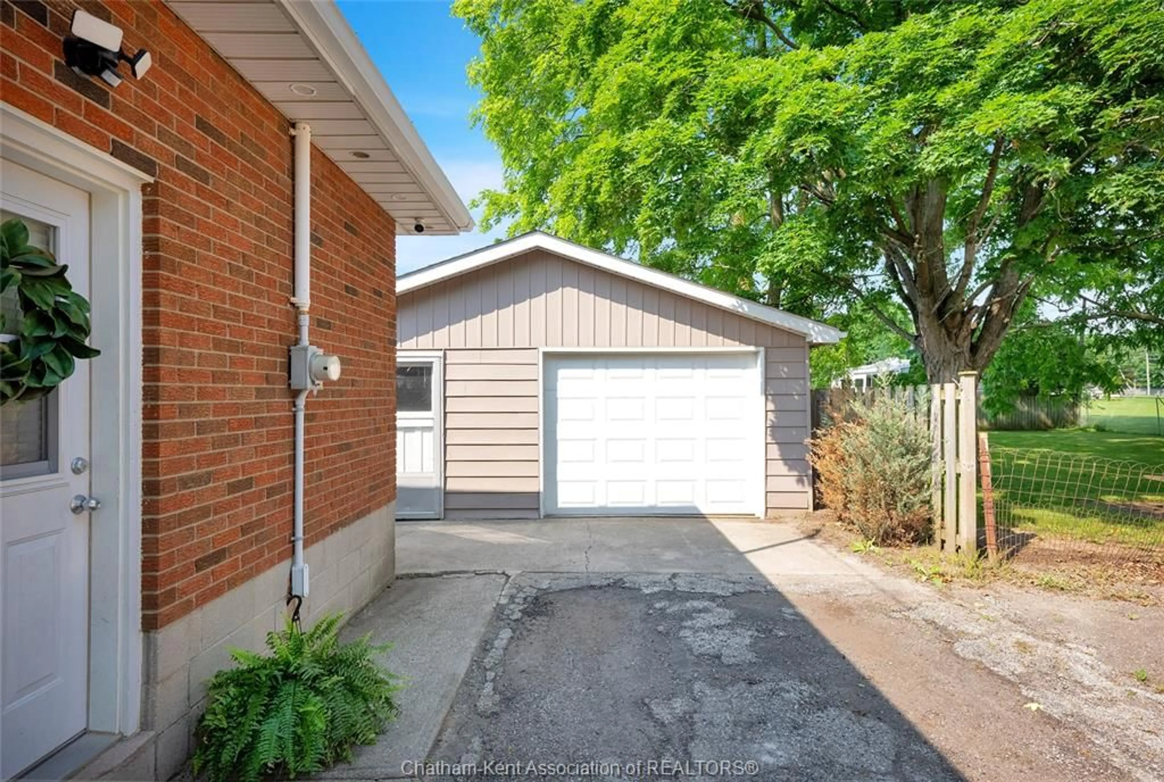 Home with brick exterior material, street for 38 Burton Ave, Chatham Ontario N7M 4Z5