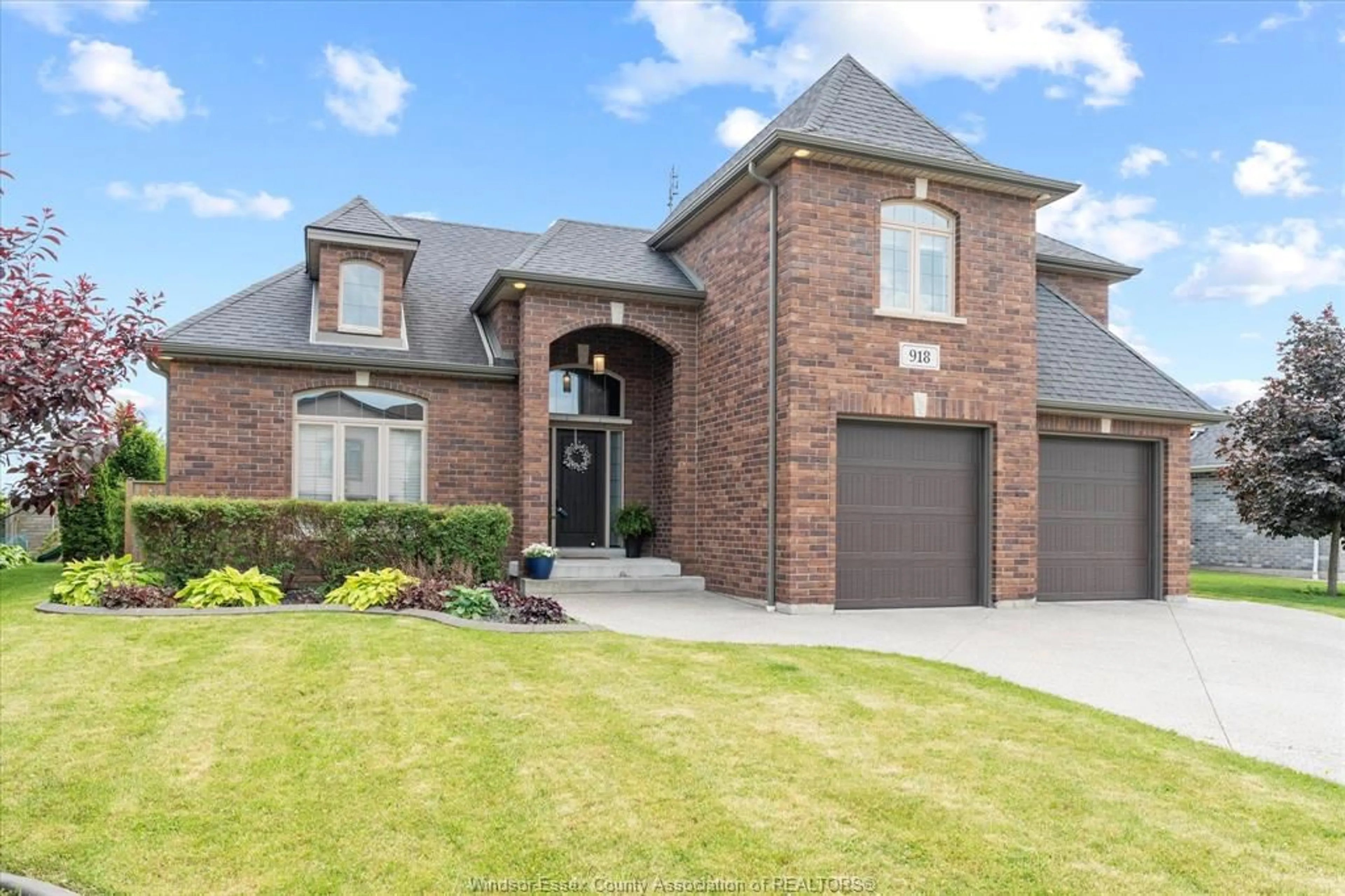 Home with brick exterior material, street for 918 Driftwood Cres, Belle River Ontario N0R 1A0