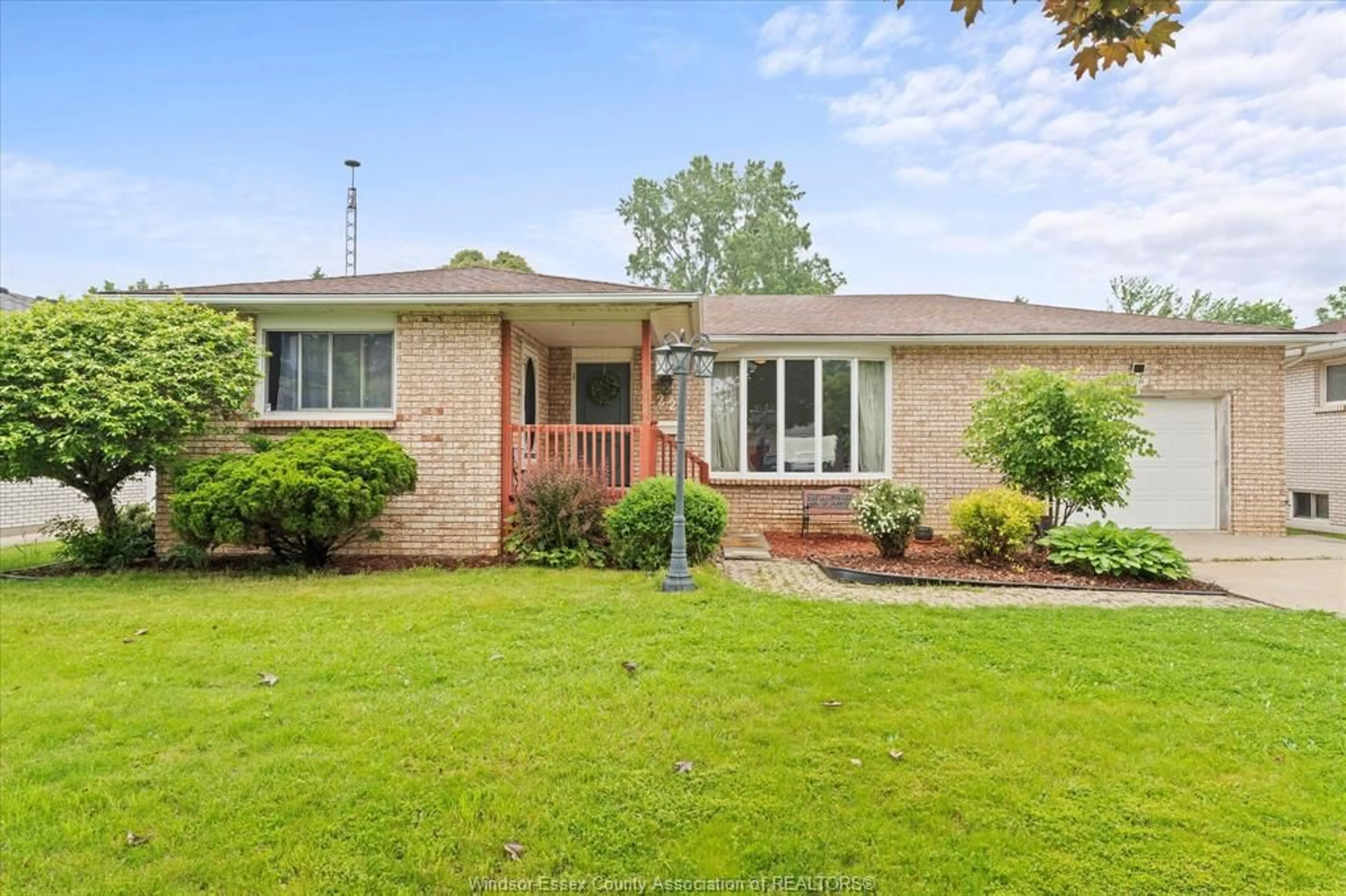 Home with brick exterior material, street for 22 BENNIE Ave, Leamington Ontario N8H 4L5
