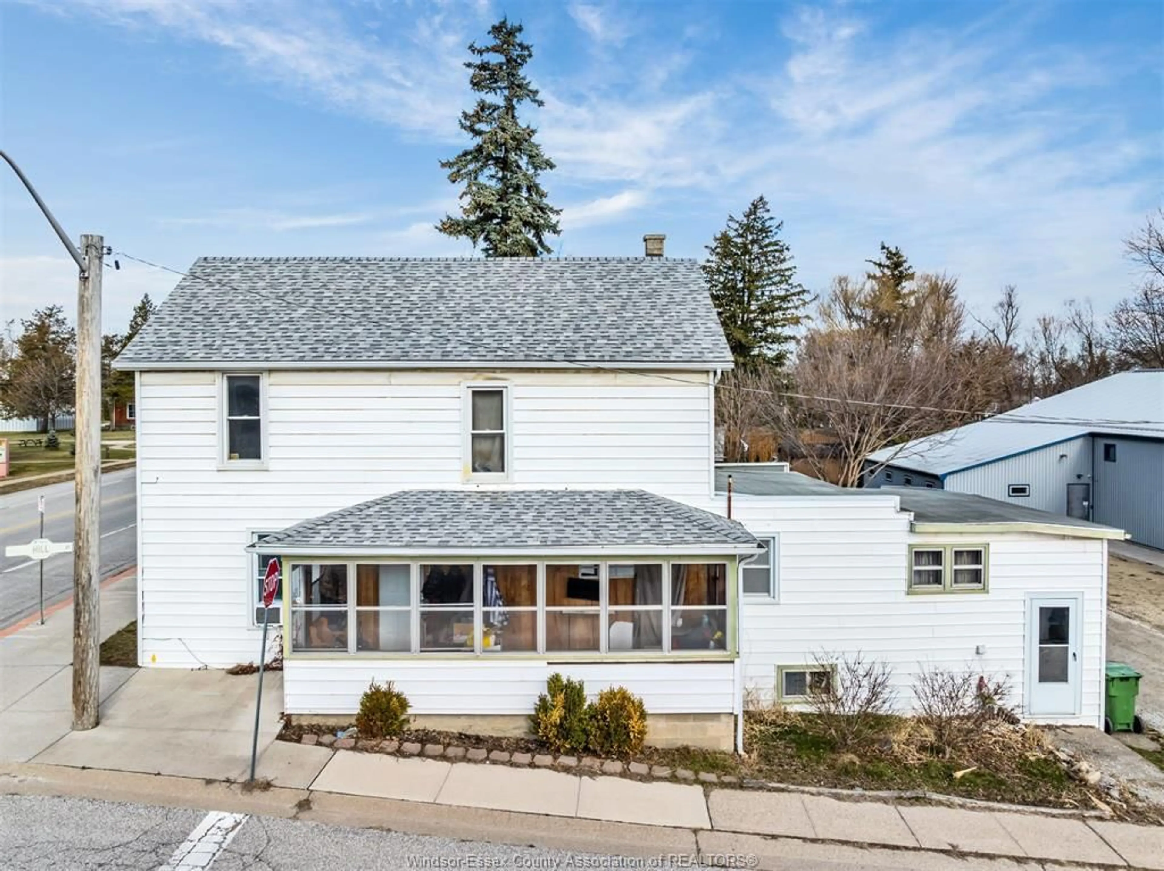 A pic from outside/outdoor area/front of a property/back of a property/a pic from drone, street for 134 County Road 34, Cottam Ontario N0R 1B0