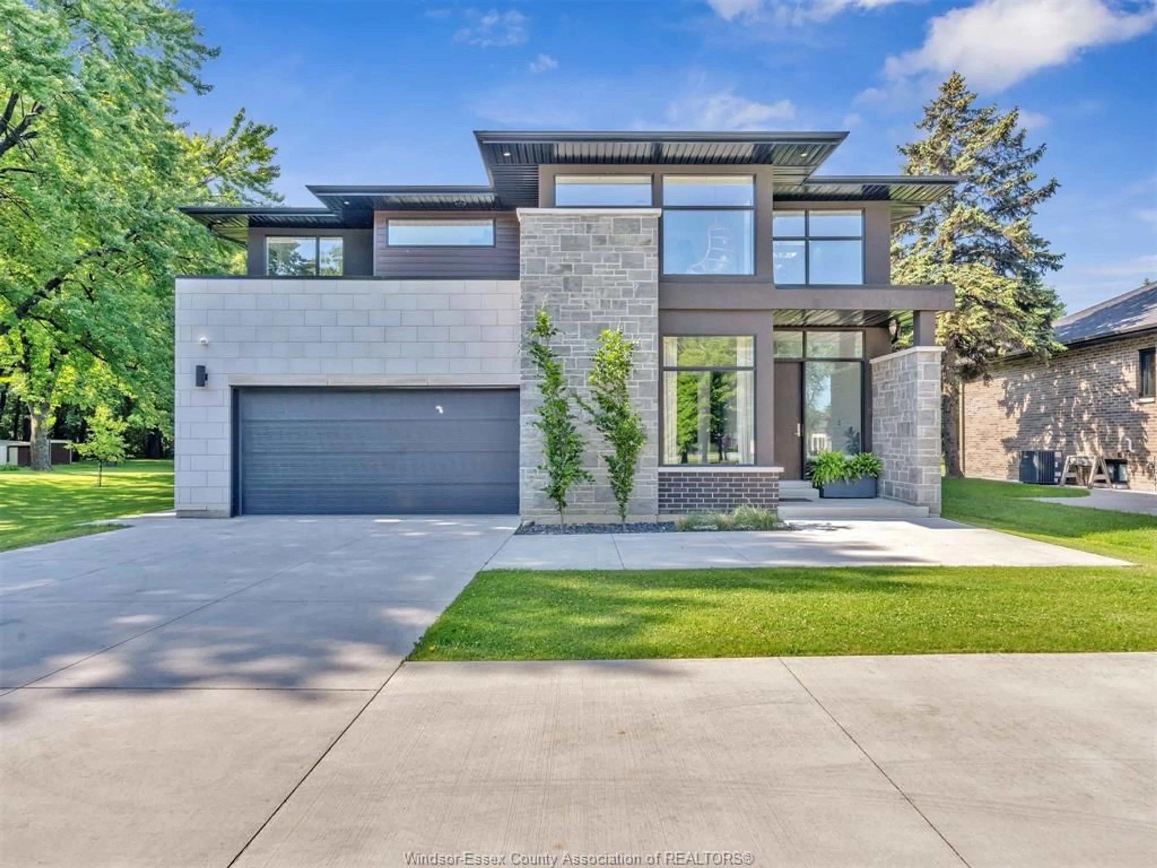 Home with brick exterior material, street for 359 OLD TECUMSEH Rd, Lakeshore Ontario N8N 3T2