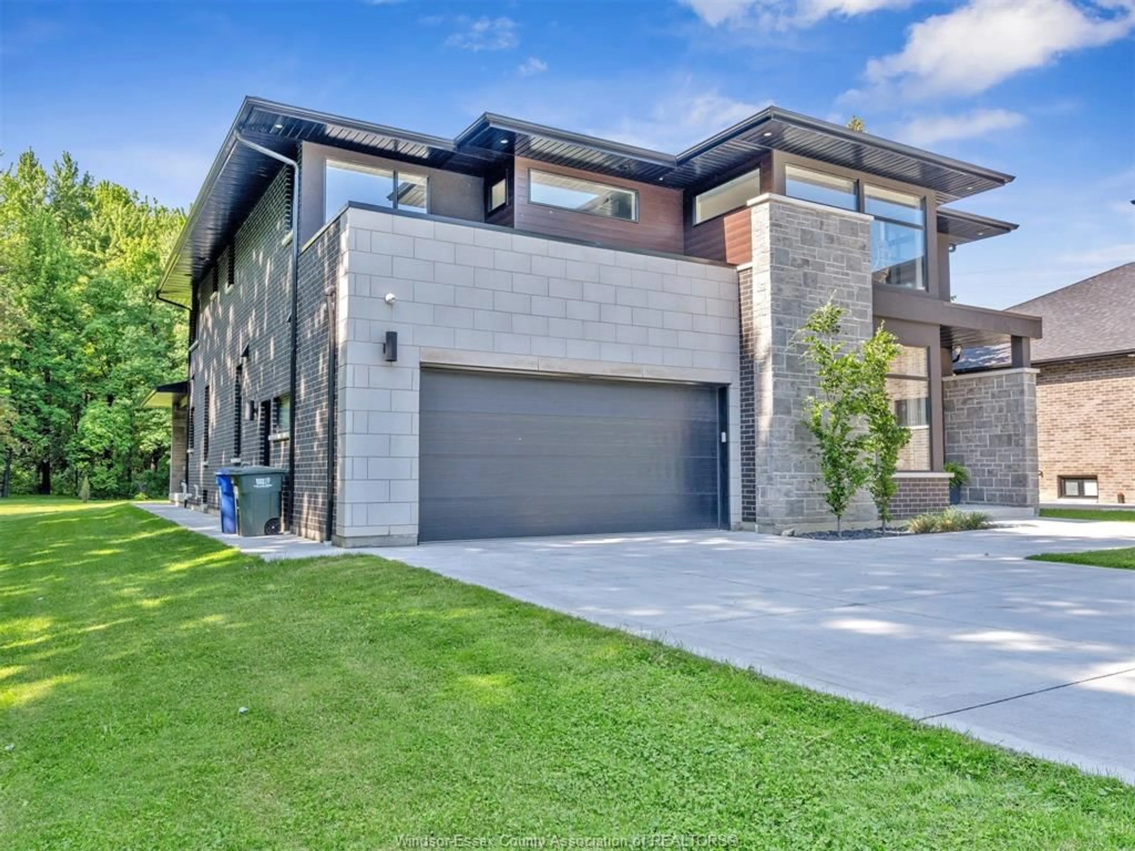 Home with brick exterior material, street for 359 OLD TECUMSEH Rd, Lakeshore Ontario N8N 3T2