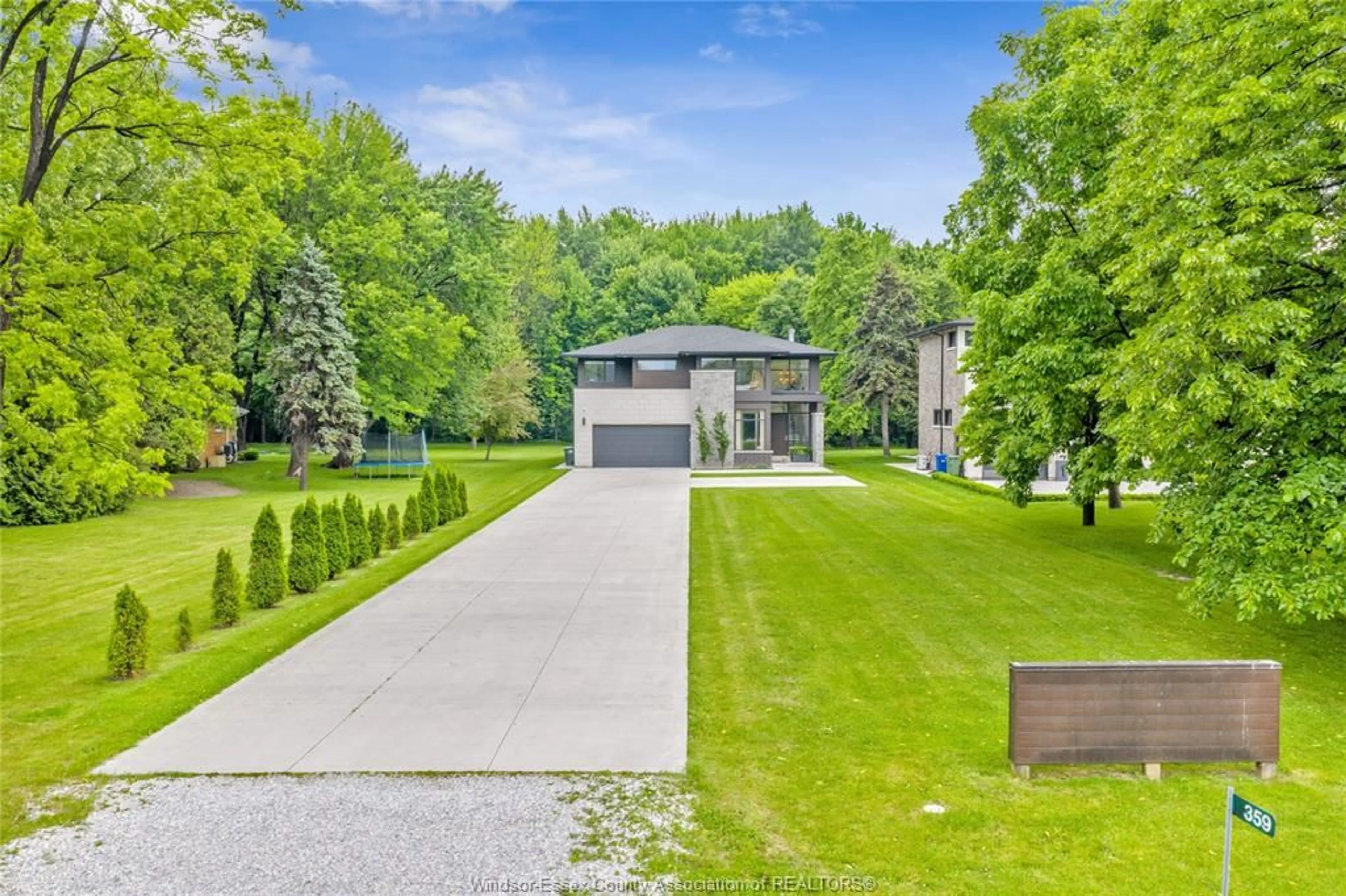A pic from outside/outdoor area/front of a property/back of a property/a pic from drone, street for 359 OLD TECUMSEH Rd, Lakeshore Ontario N8N 3T2