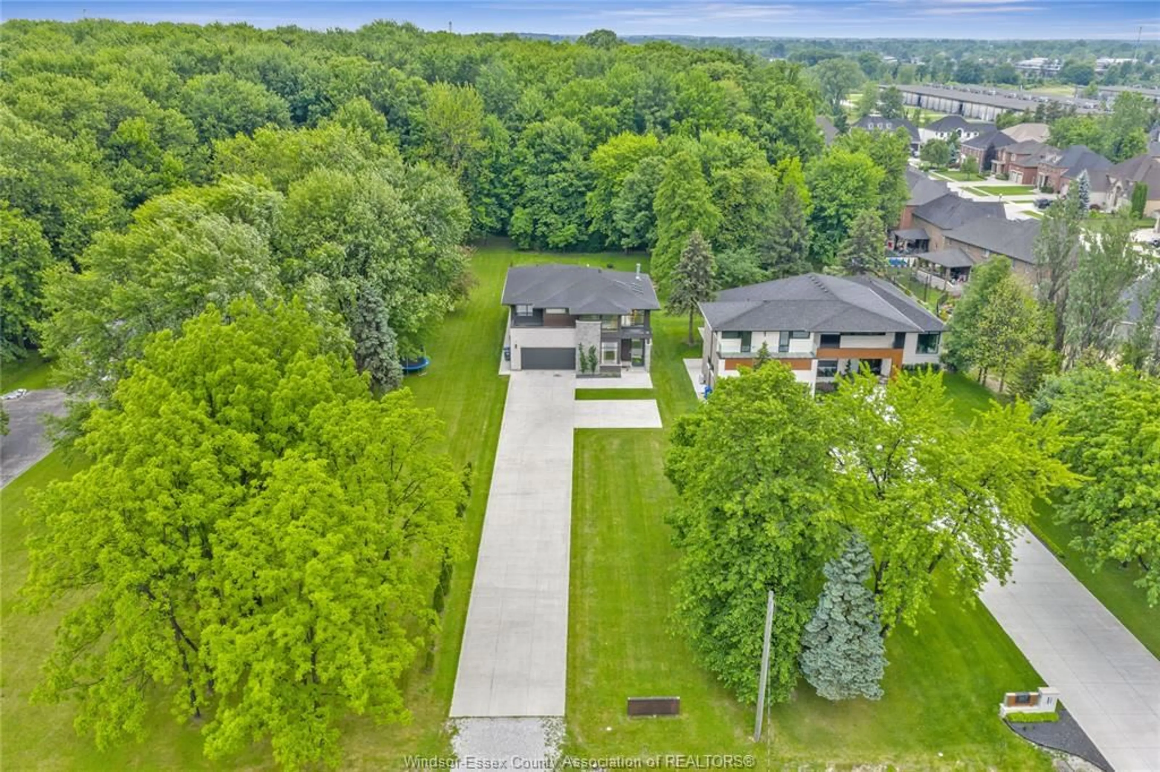 A pic from outside/outdoor area/front of a property/back of a property/a pic from drone, water/lake/river/ocean view for 359 OLD TECUMSEH Rd, Lakeshore Ontario N8N 3T2