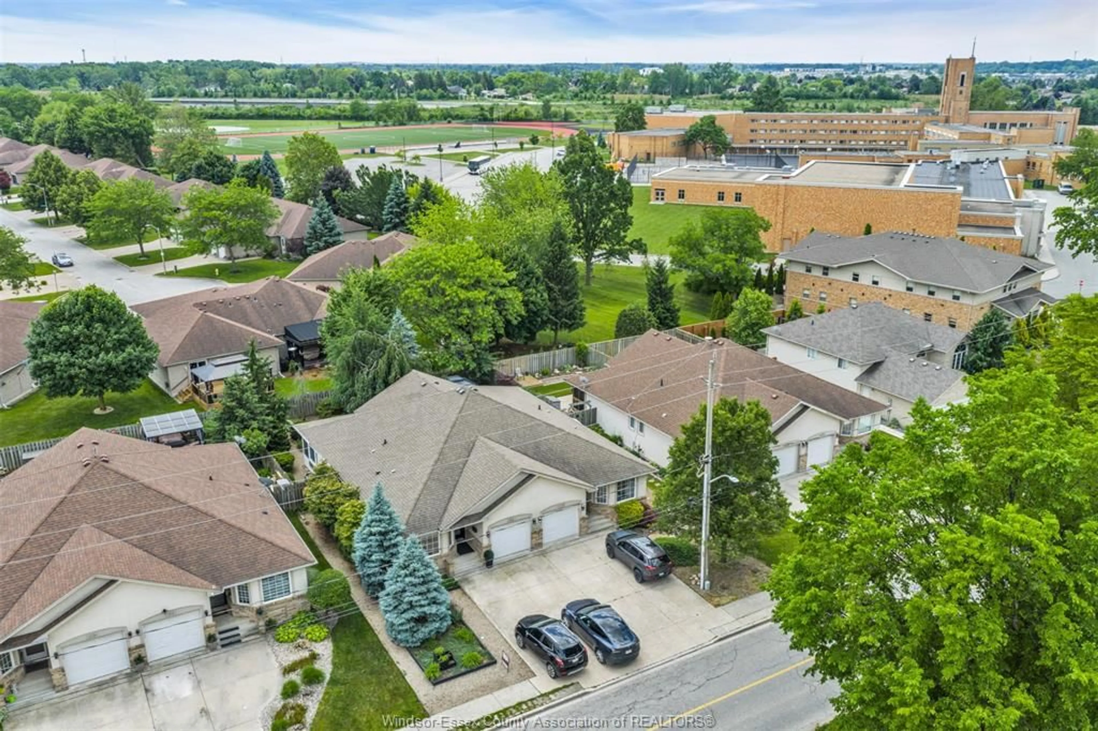 A pic from outside/outdoor area/front of a property/back of a property/a pic from drone, unknown for 879 COUSINEAU Rd, Windsor Ontario N9G 1V6