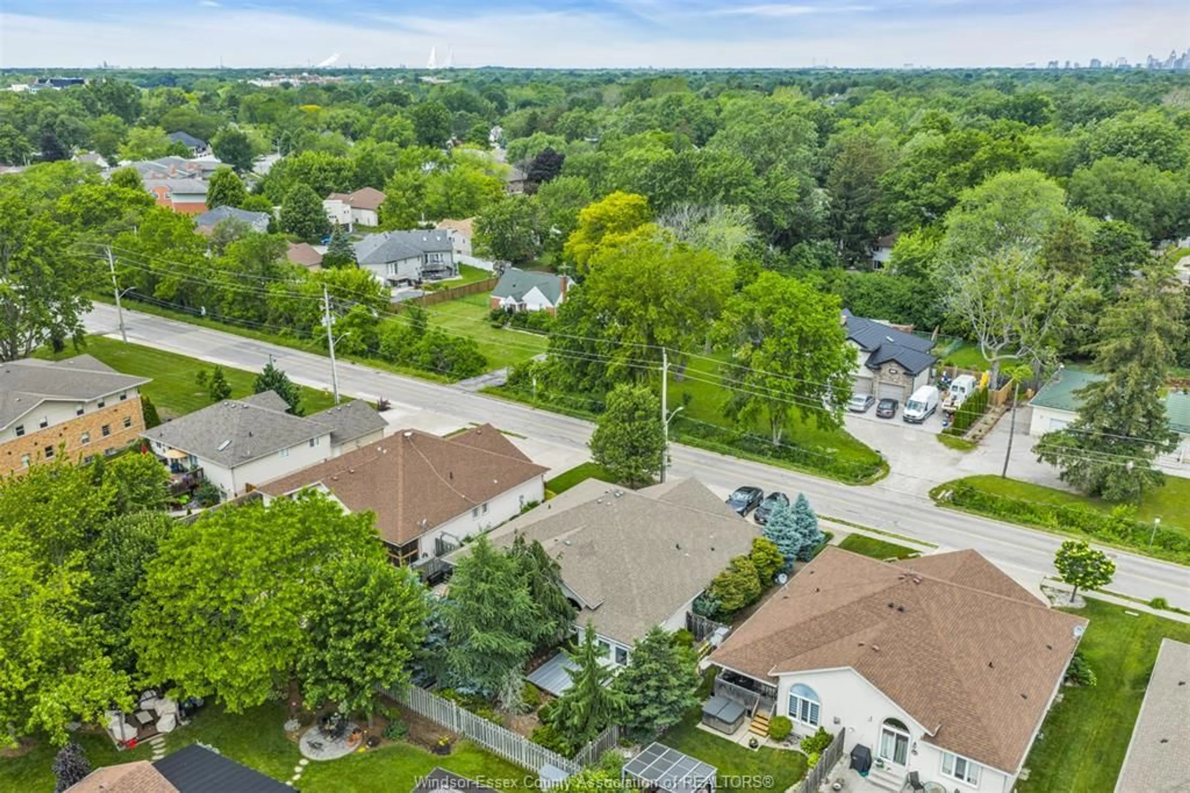 A pic from outside/outdoor area/front of a property/back of a property/a pic from drone, street for 879 COUSINEAU Rd, Windsor Ontario N9G 1V6