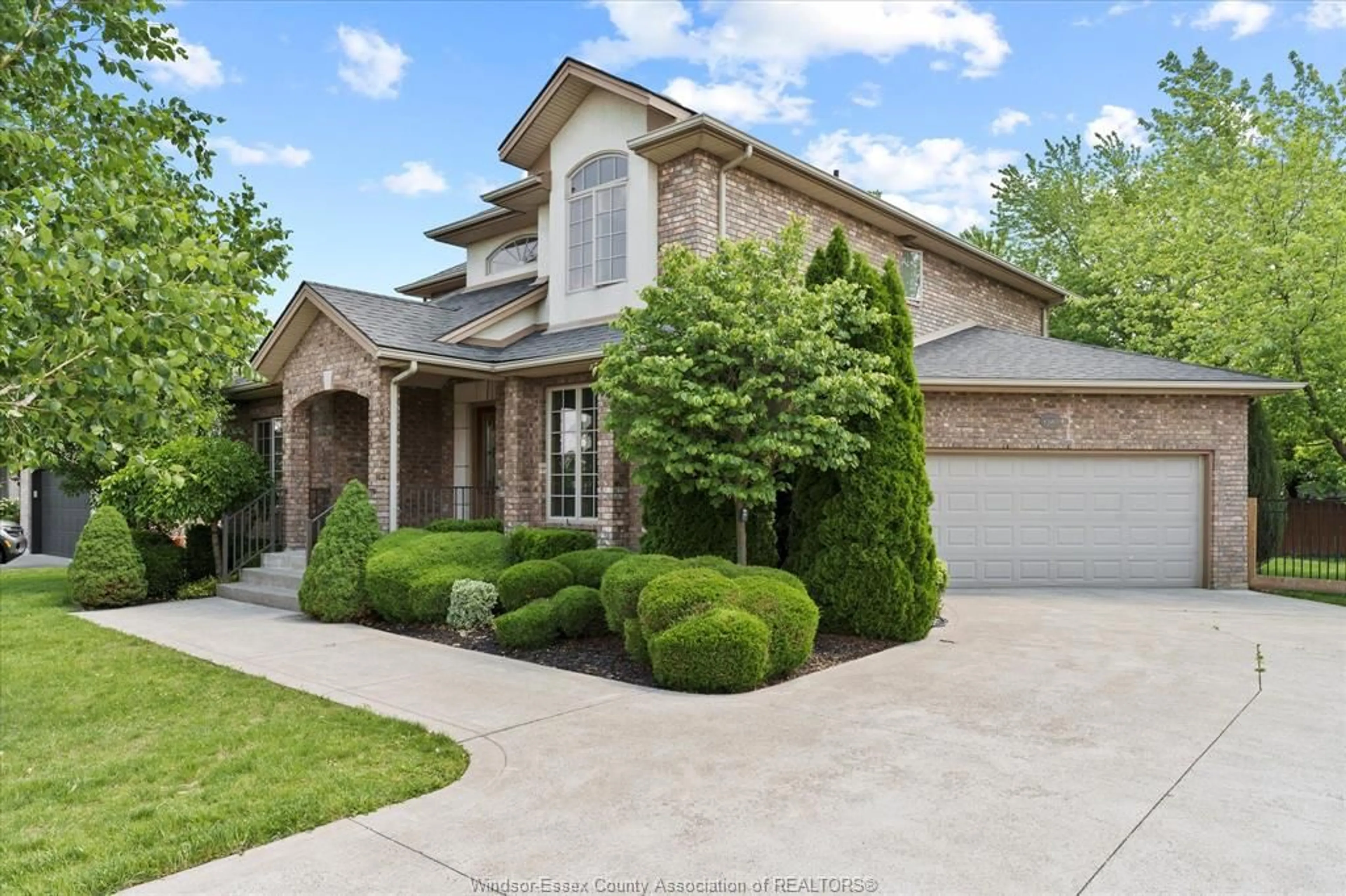 Home with brick exterior material, street for 1387 CROSSWINDS Dr, Lakeshore Ontario N0R 1A0