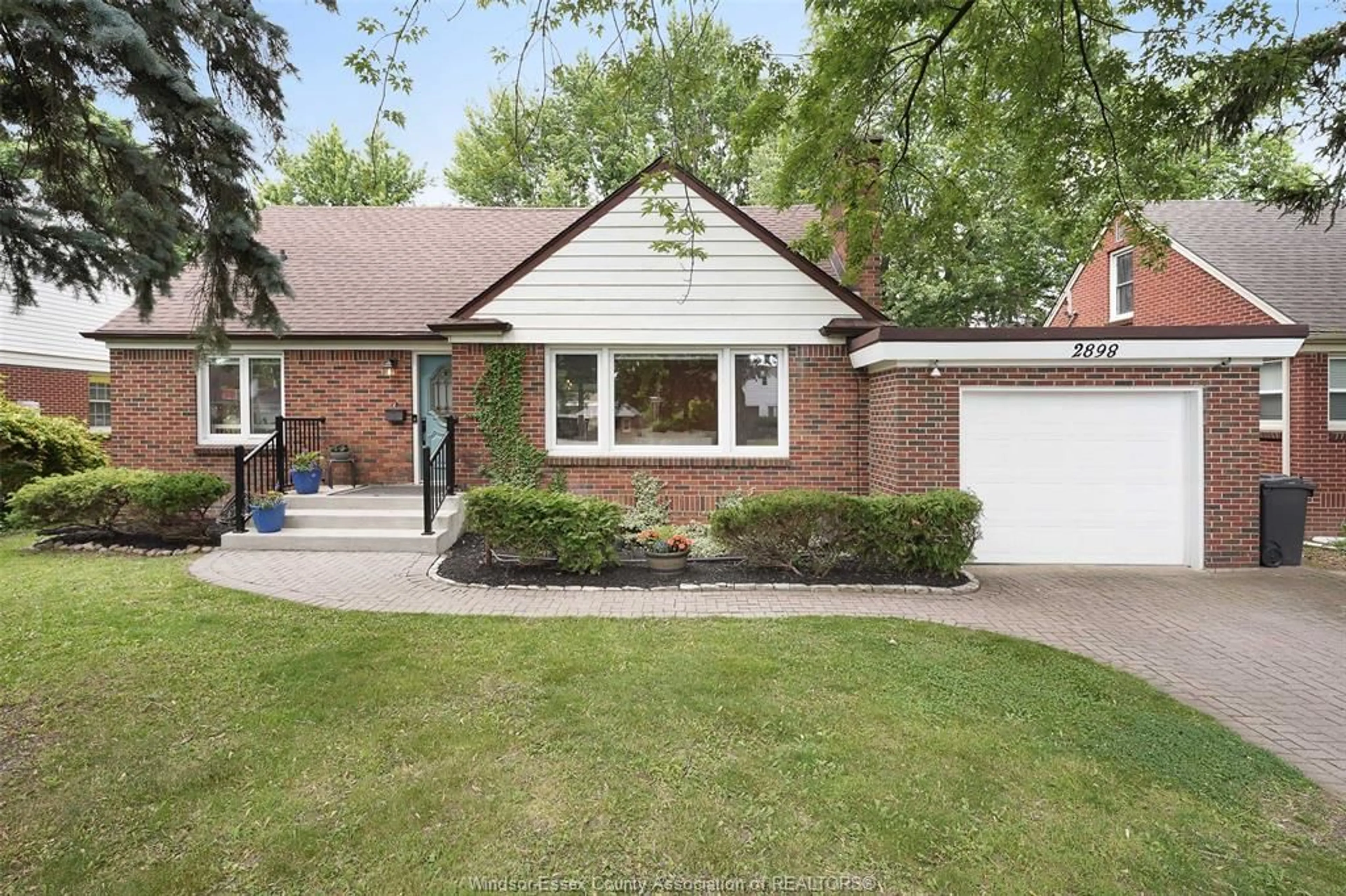 Home with brick exterior material, street for 2898 Alexandra Ave, Windsor Ontario N9E 2J7