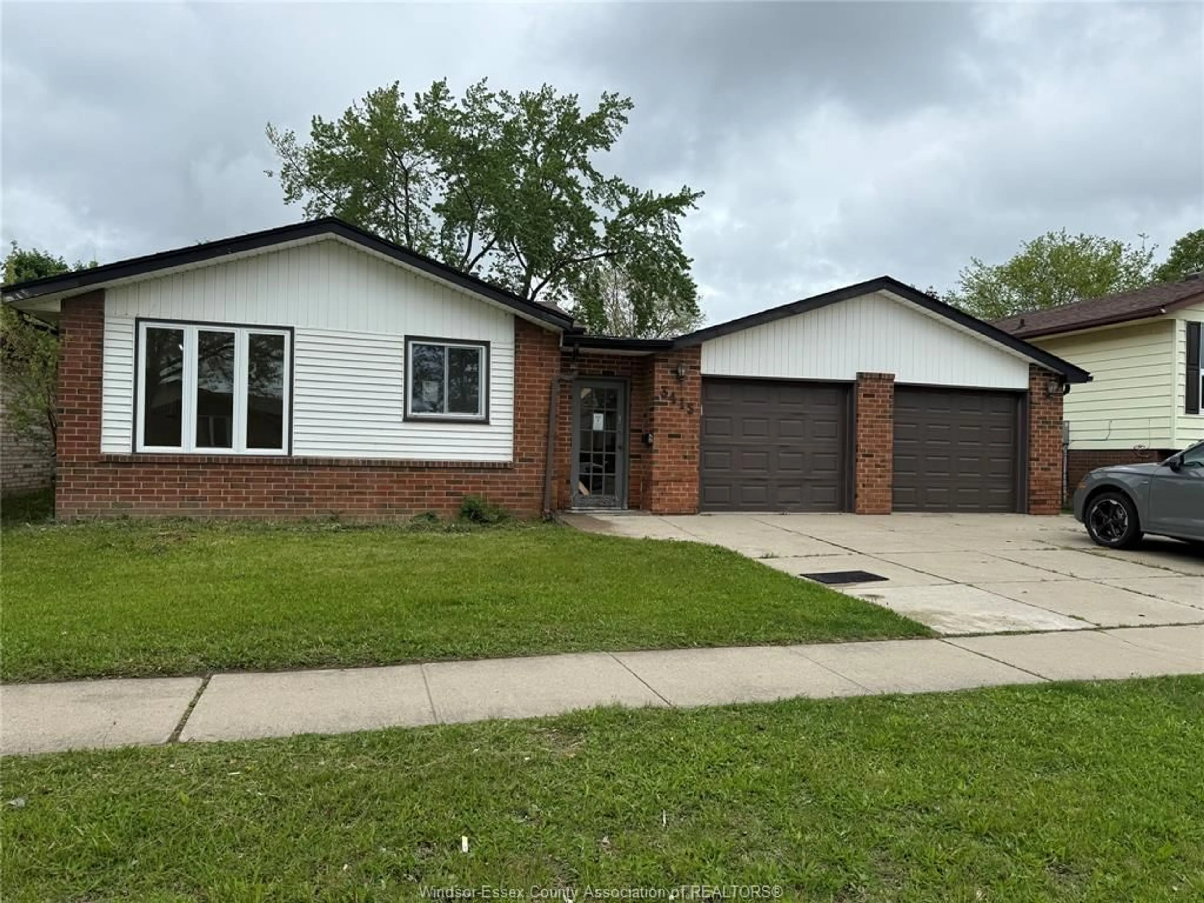 Home with brick exterior material, street for 3415 FOREST GLADE Dr, Windsor Ontario N8R 1X8