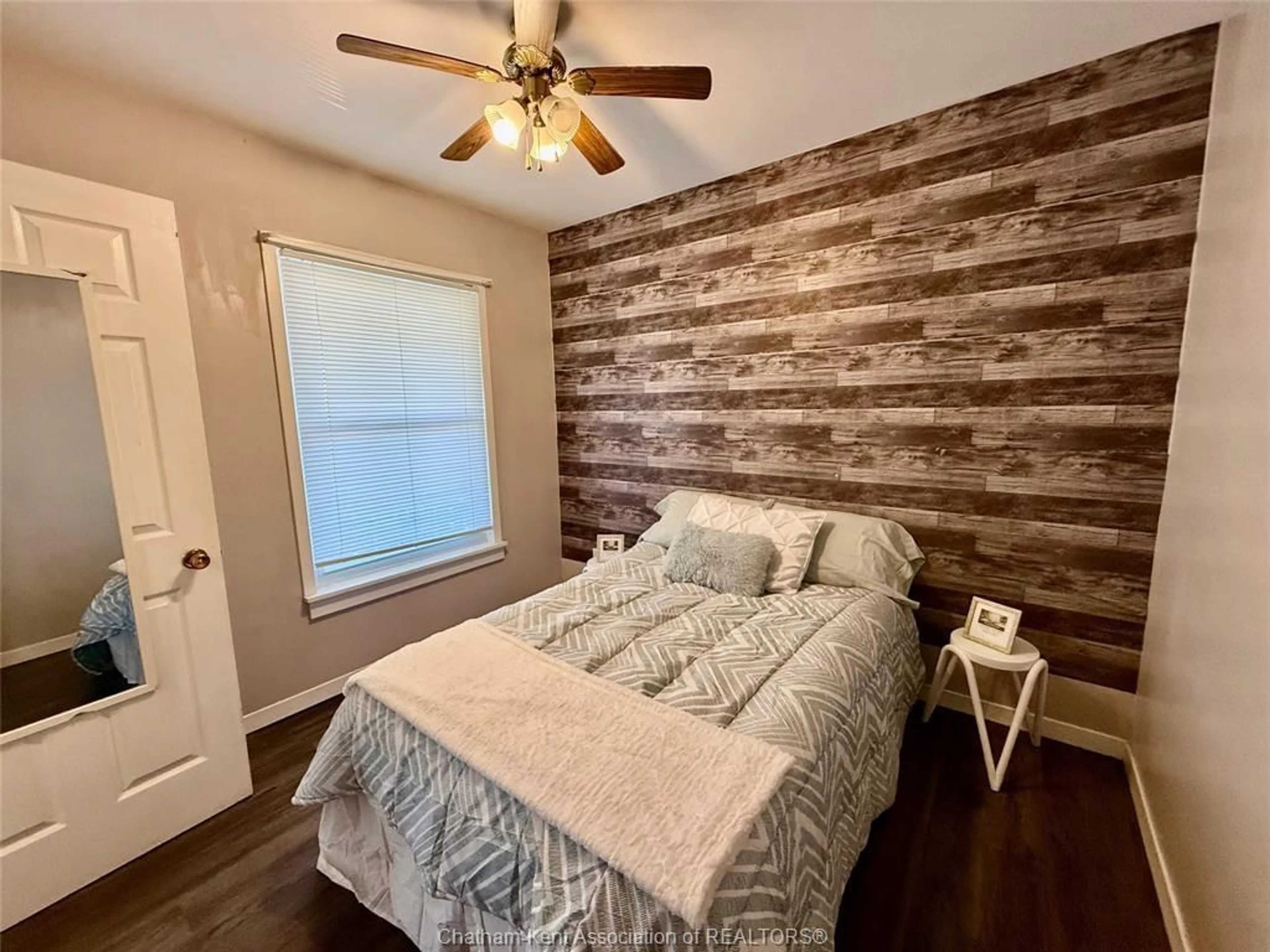 Bedroom with bed, wood/laminate floor for 22 Minnie St, Wallaceburg Ontario N8A 1S4