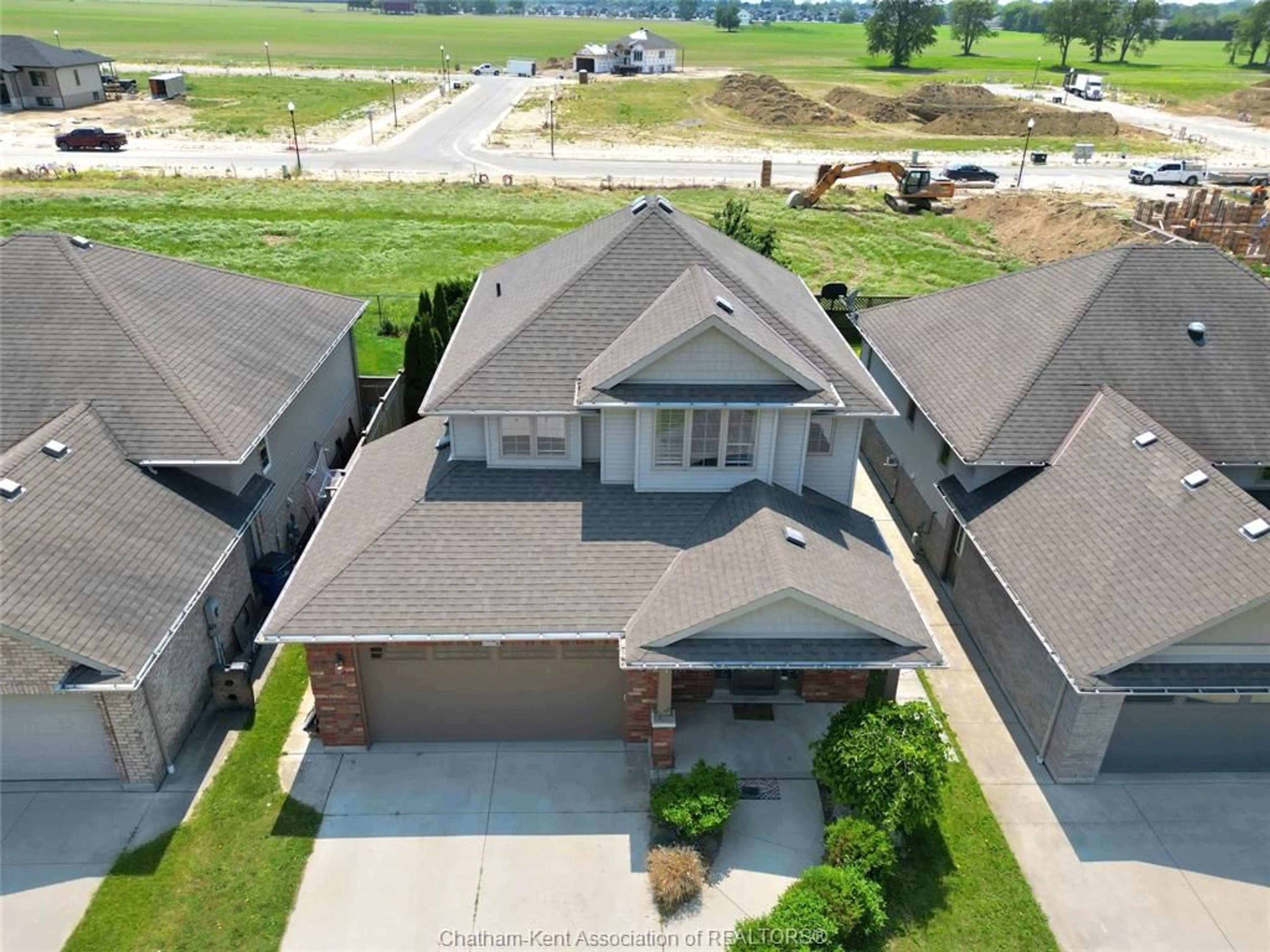 A pic from outside/outdoor area/front of a property/back of a property/a pic from drone, street for 82 Molengraaf Way, Chatham Ontario N7M 0A2
