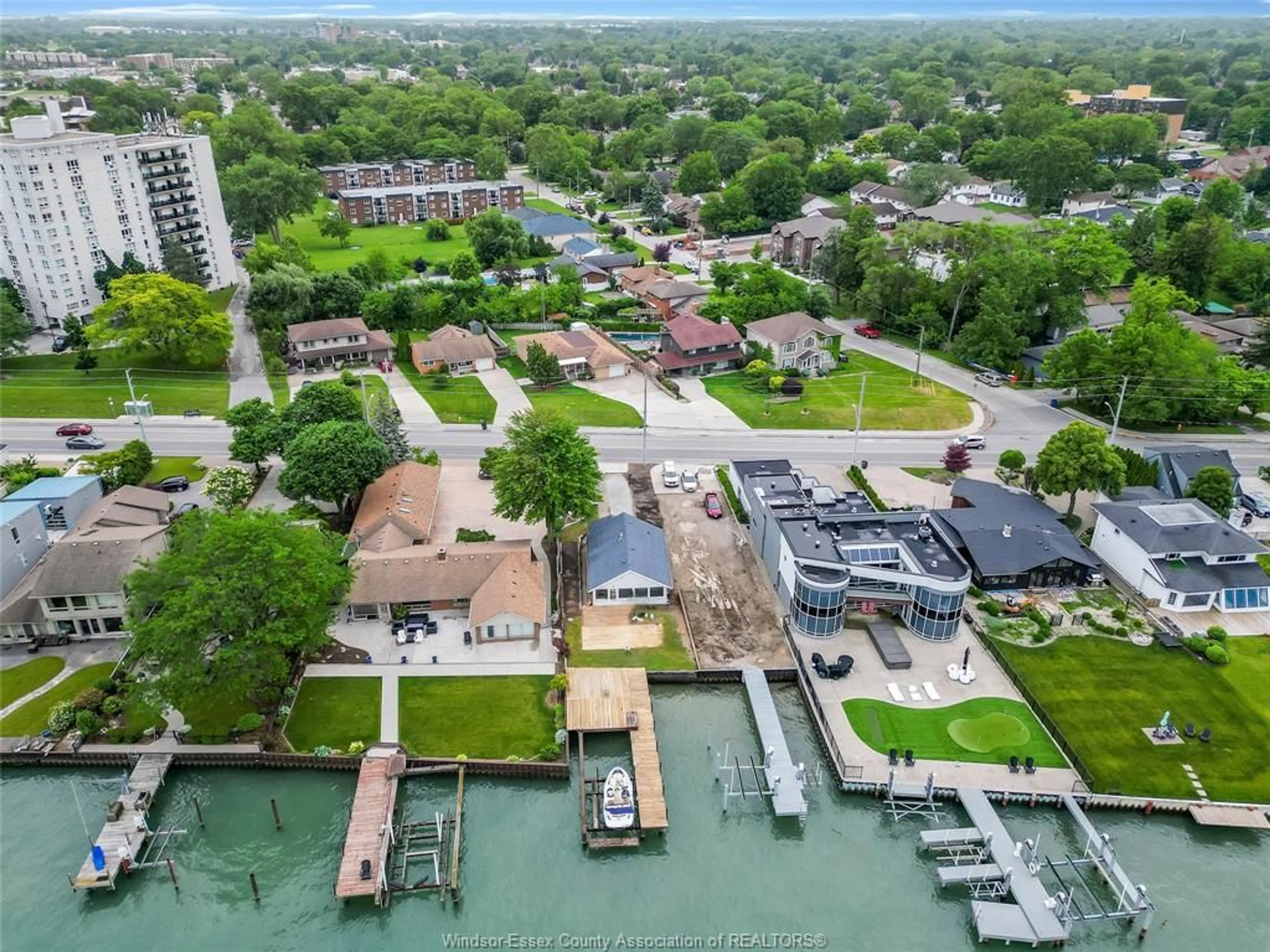 A pic from outside/outdoor area/front of a property/back of a property/a pic from drone, water/lake/river/ocean view for 8266 Riverside, Windsor Ontario N8S 1E6