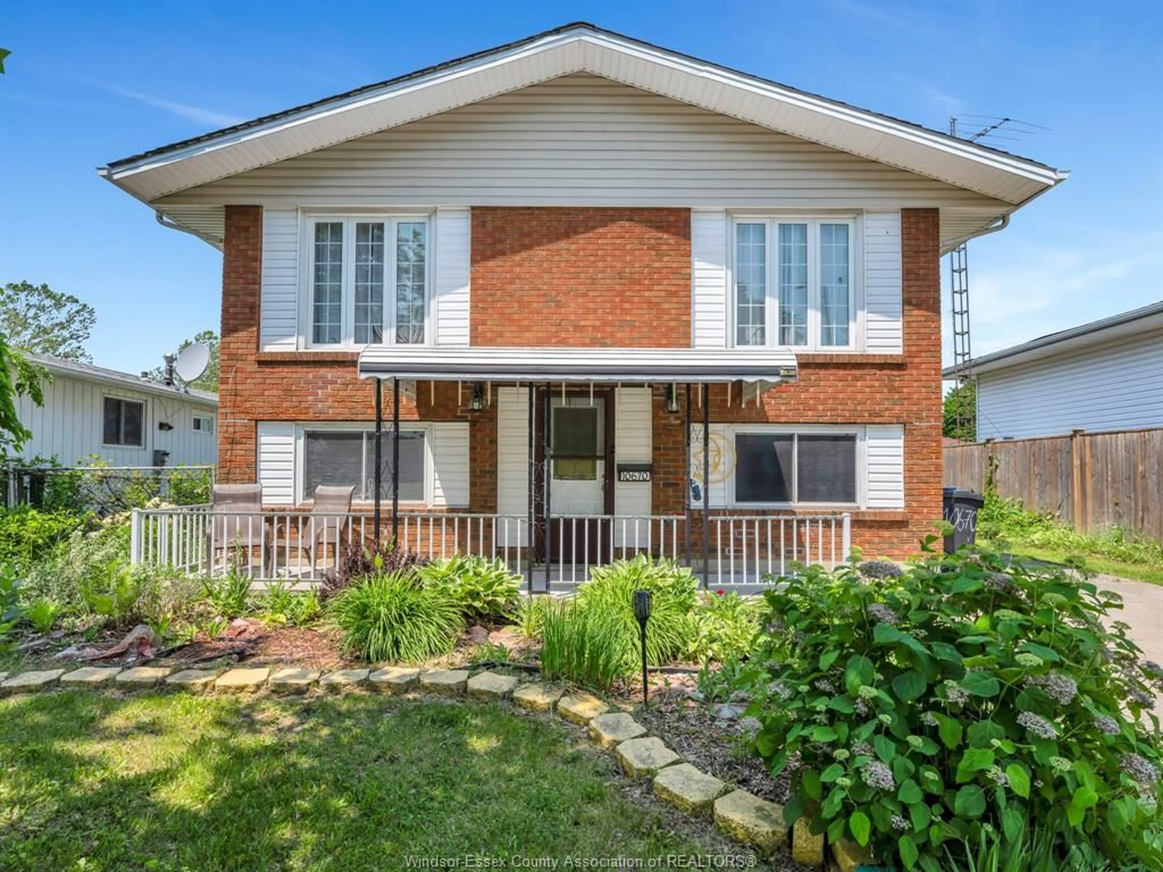 Home with brick exterior material, street for 10670 LAMBETH Rd, Windsor Ontario N8R 1C9