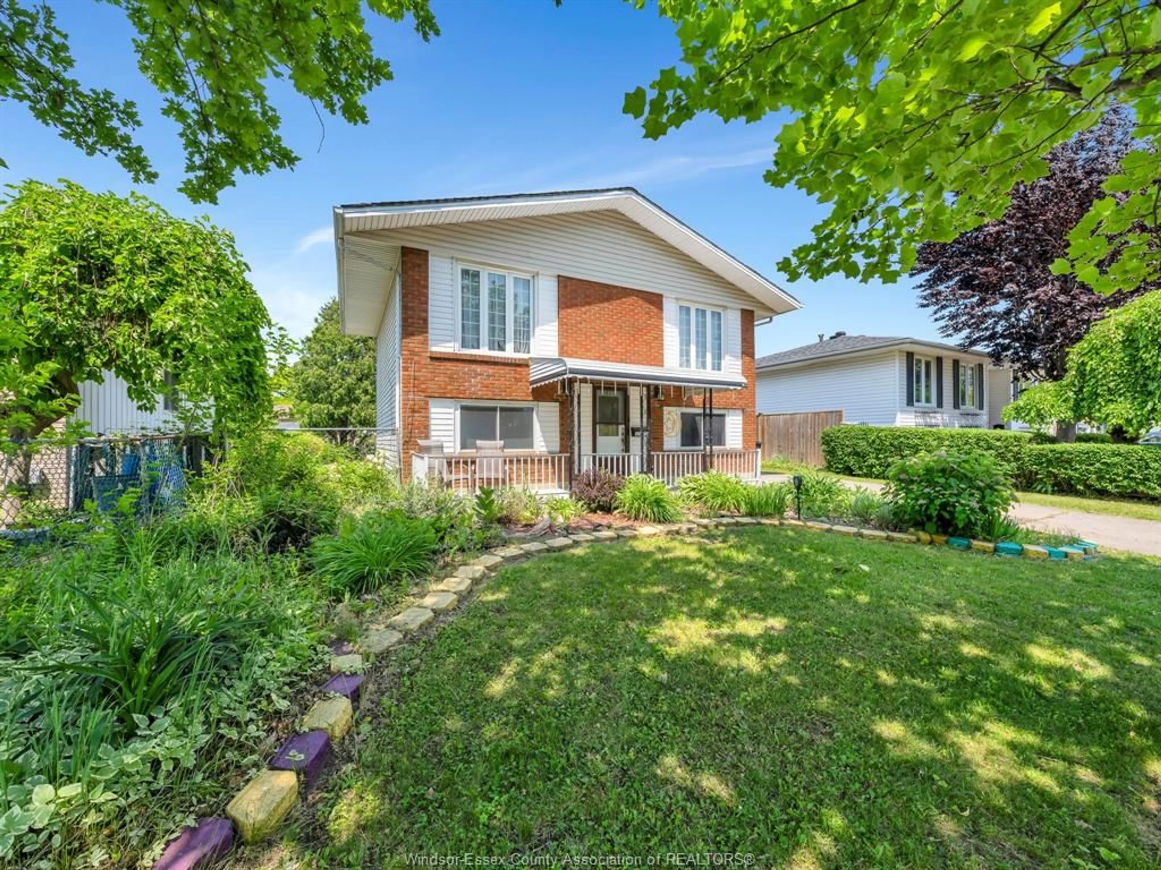 Home with brick exterior material, street for 10670 LAMBETH Rd, Windsor Ontario N8R 1C9