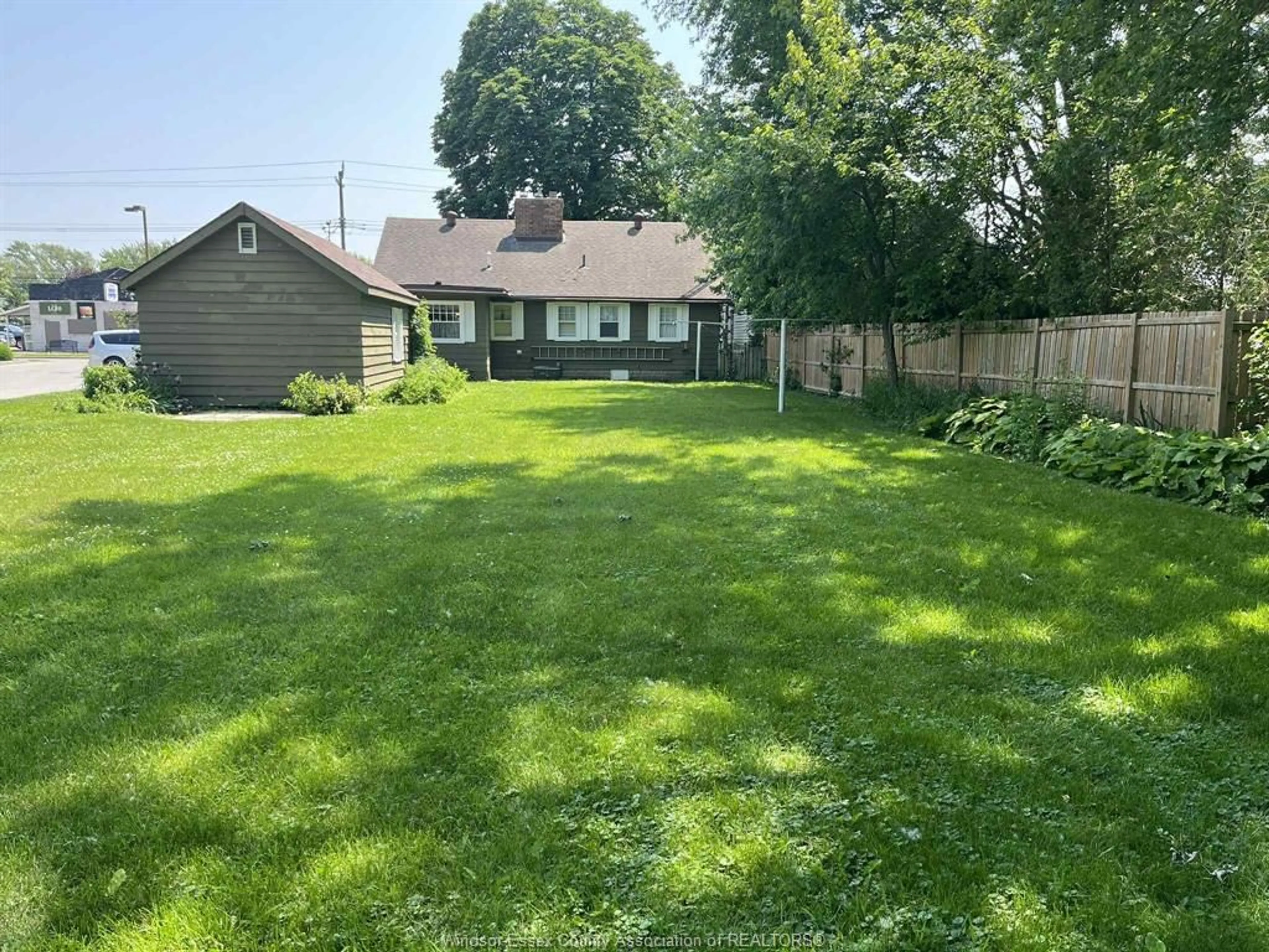 A pic from outside/outdoor area/front of a property/back of a property/a pic from drone, street for 6898 TECUMSEH Rd, Stoney Point Ontario N9R 1N0