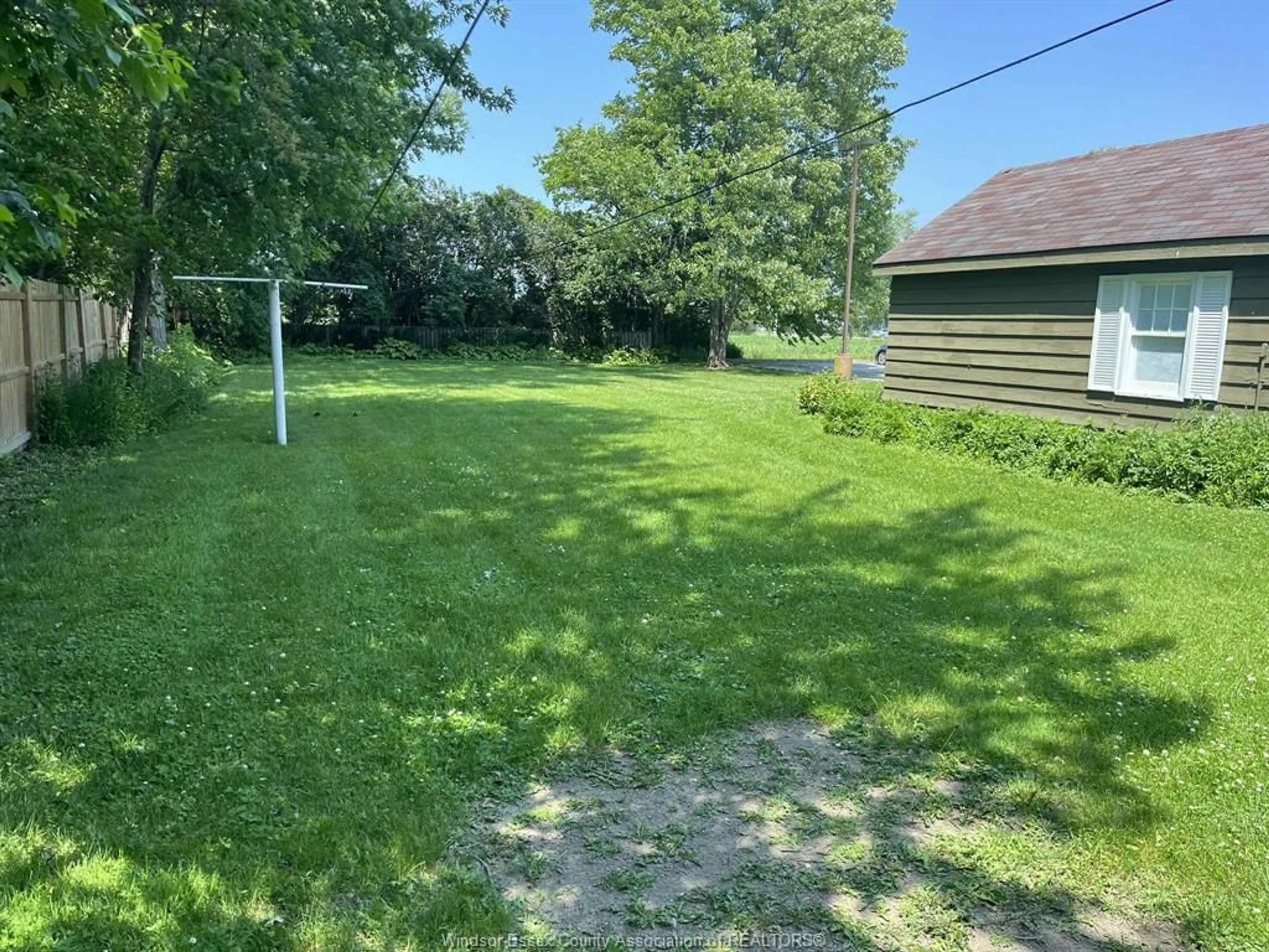 A pic from outside/outdoor area/front of a property/back of a property/a pic from drone, street for 6898 TECUMSEH Rd, Stoney Point Ontario N9R 1N0