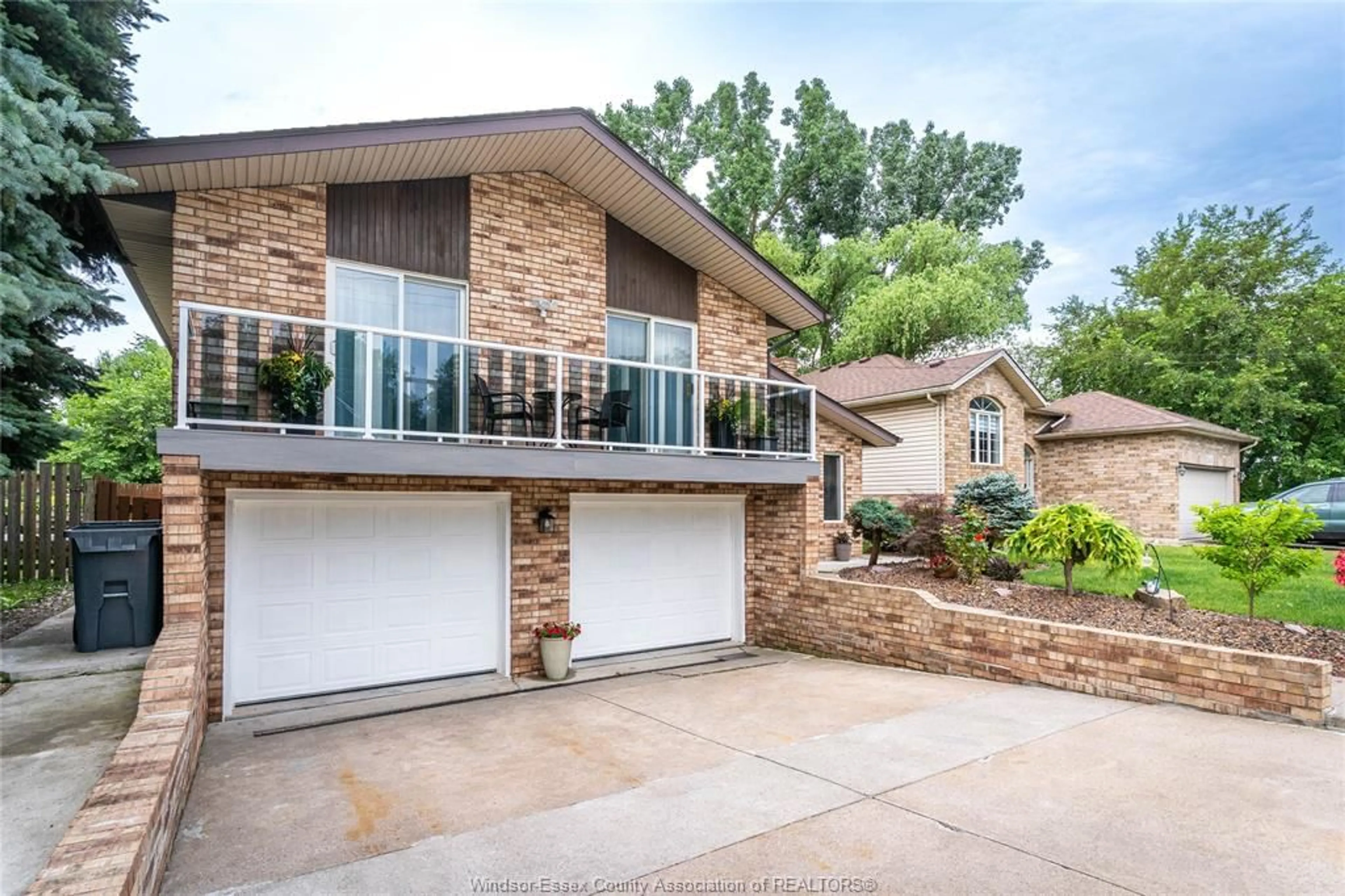 Home with brick exterior material, unknown for 2415 CABANA ROAD  W, Windsor Ontario N9G 1E2