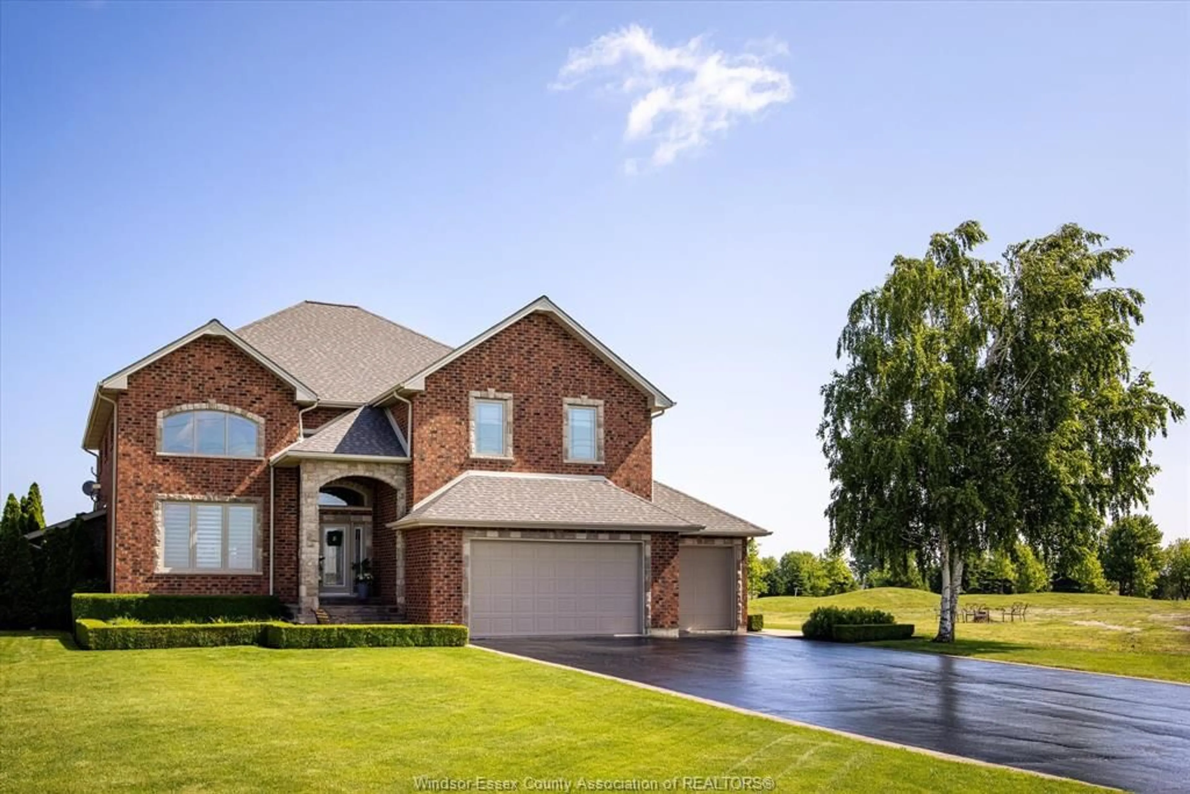 Home with brick exterior material, street for 851 COUNTY RD 2, Lakeshore Ontario N8L 1K5
