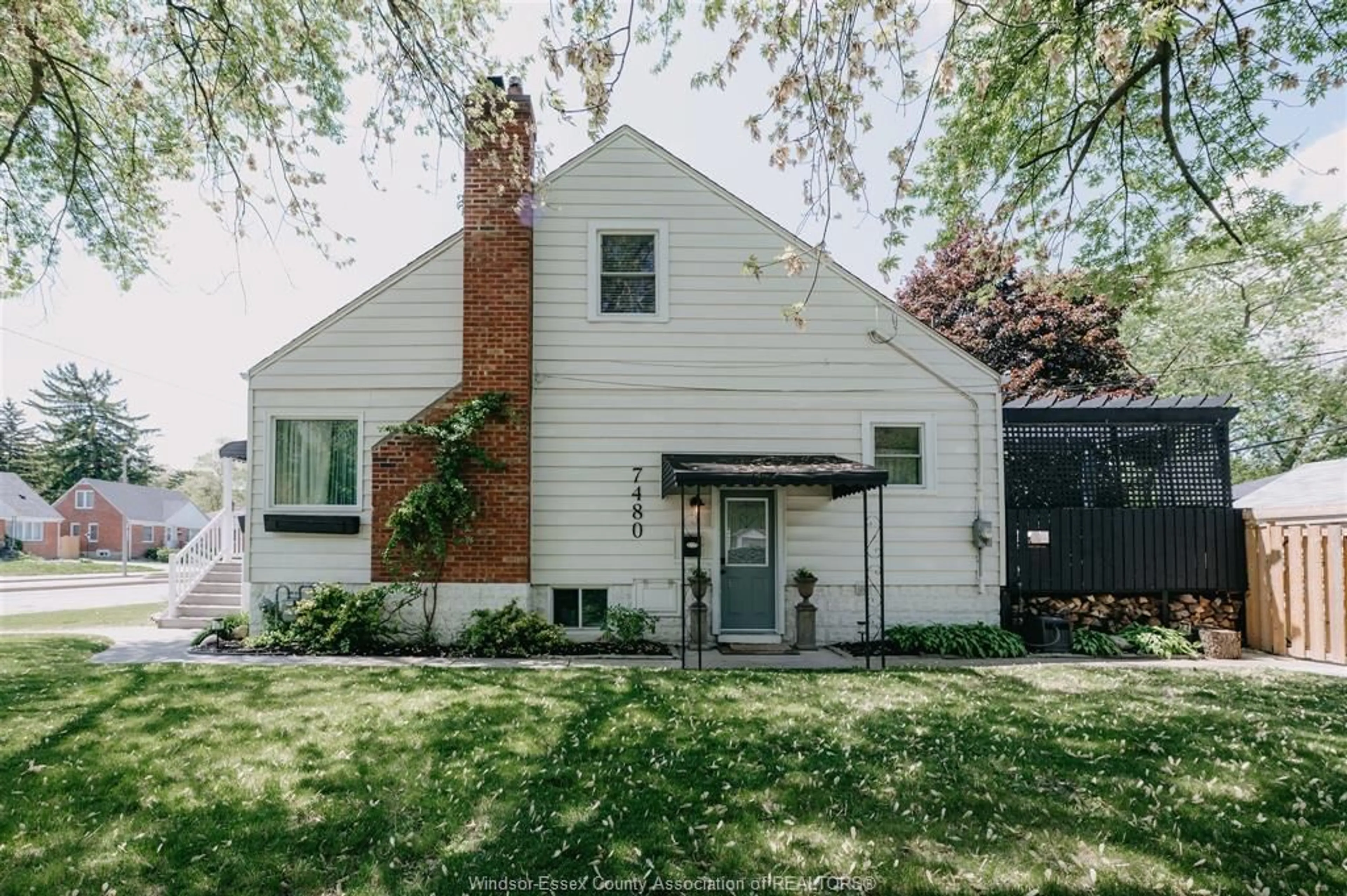 Home with brick exterior material, street for 7480 Wyandotte St, Windsor Ontario N8S 1S1