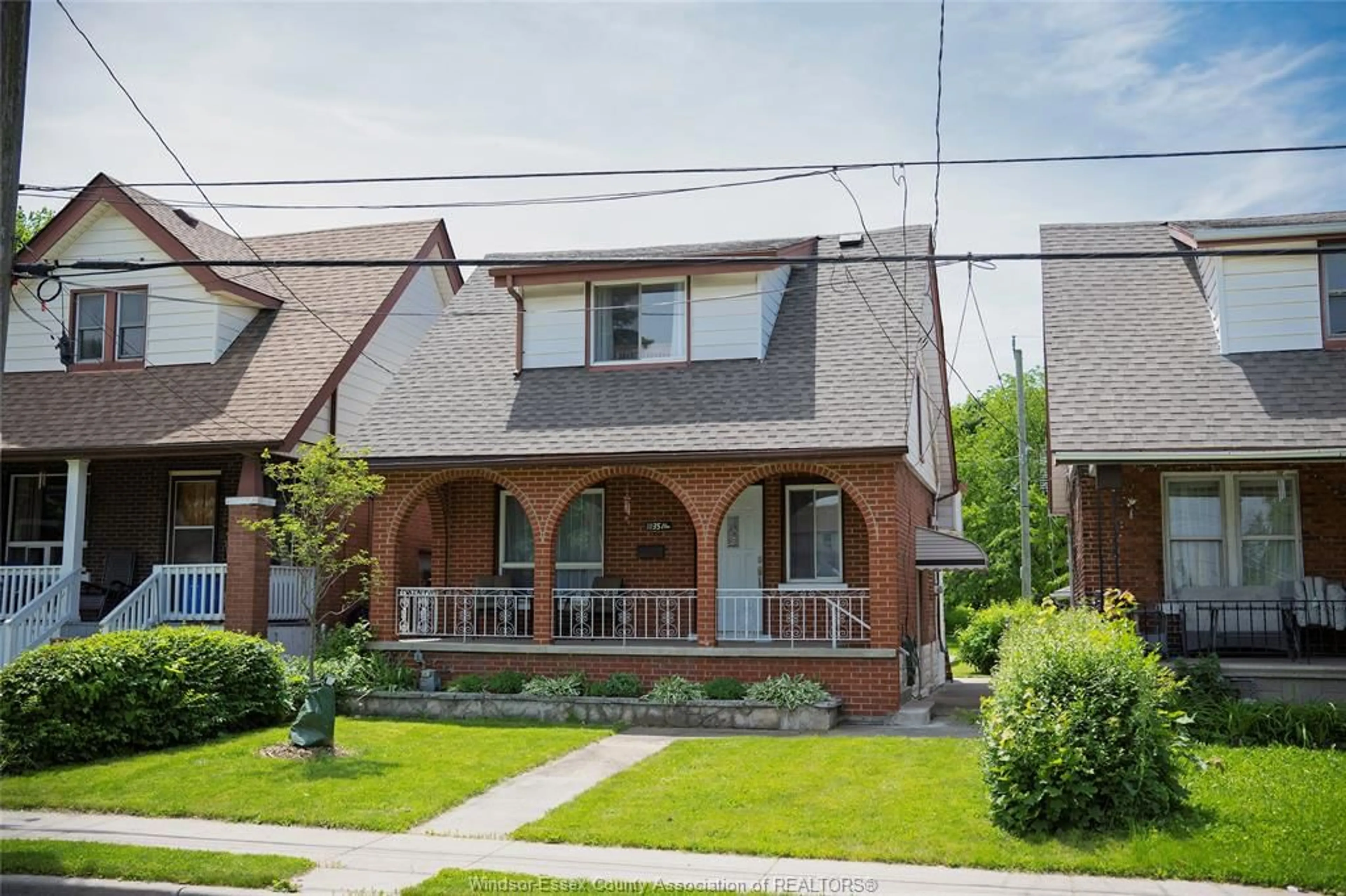 Home with brick exterior material, street for 1035 ELM AVE, Windsor Ontario N9A 5H8