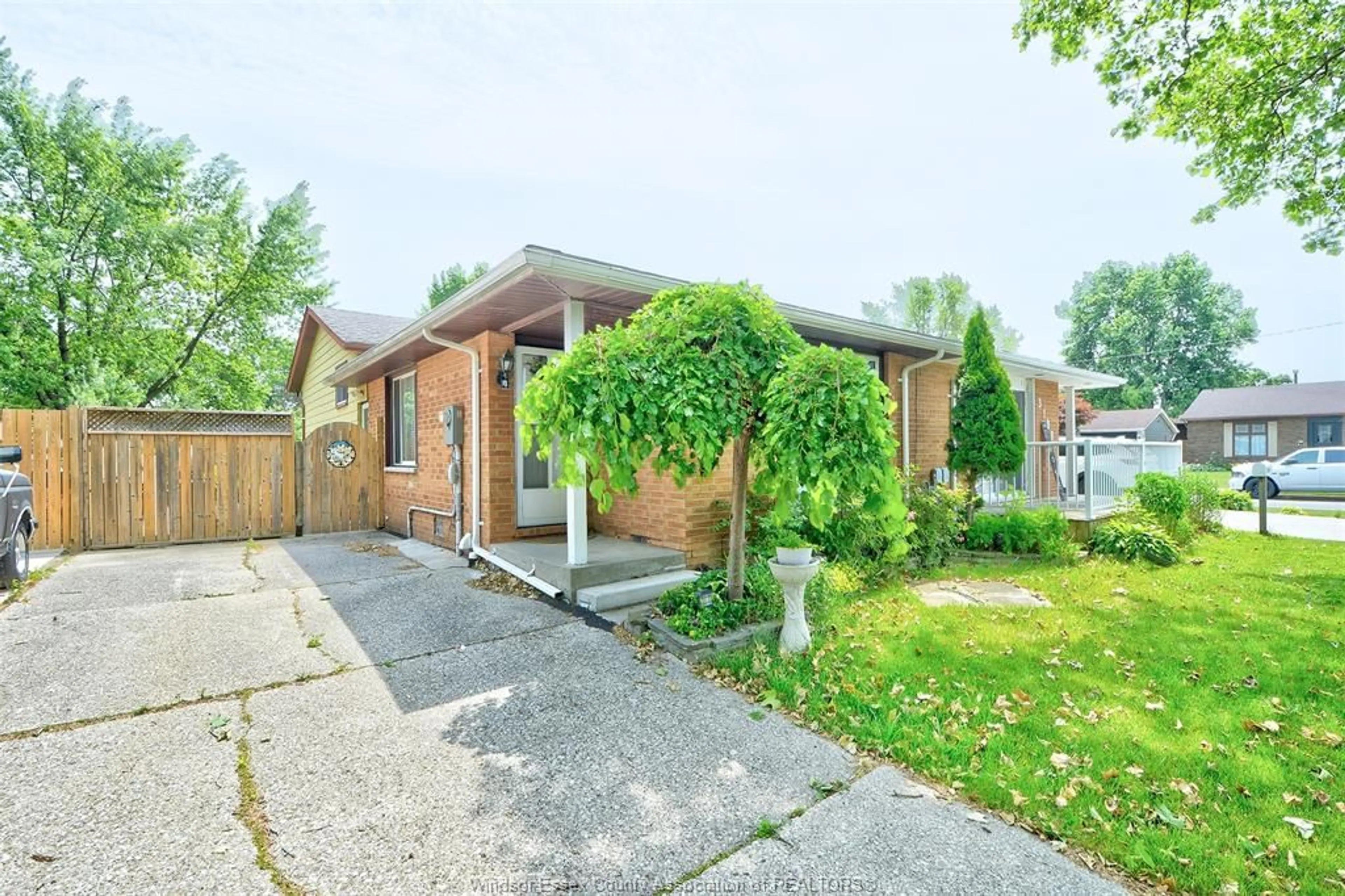 Home with brick exterior material, street for 3196 ELMWOOD Cres, Windsor Ontario N8R 1X4