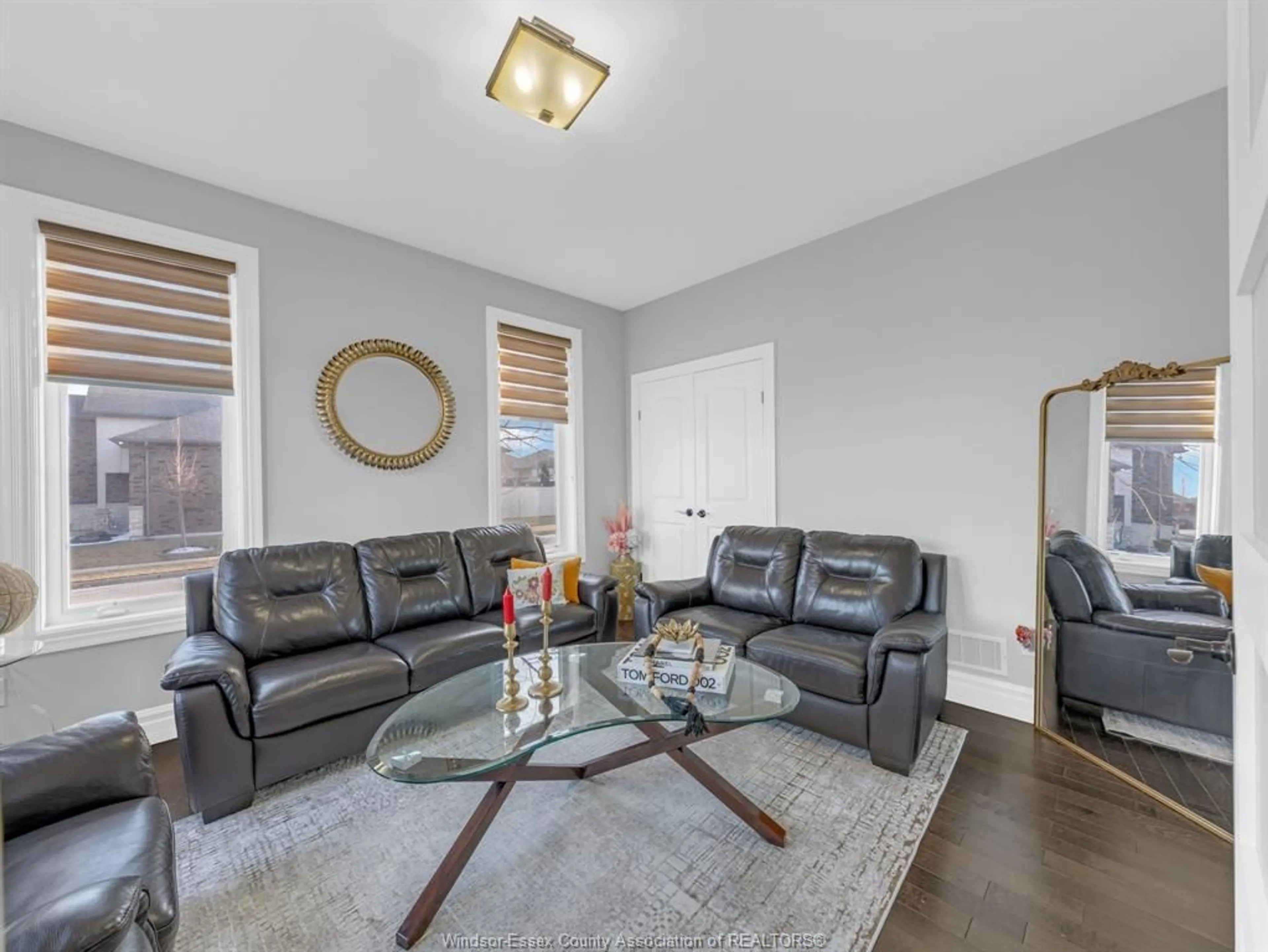 Living room with furniture, wood/laminate floor for 3780 ZANZIBAR, Windsor Ontario N9G 0A4