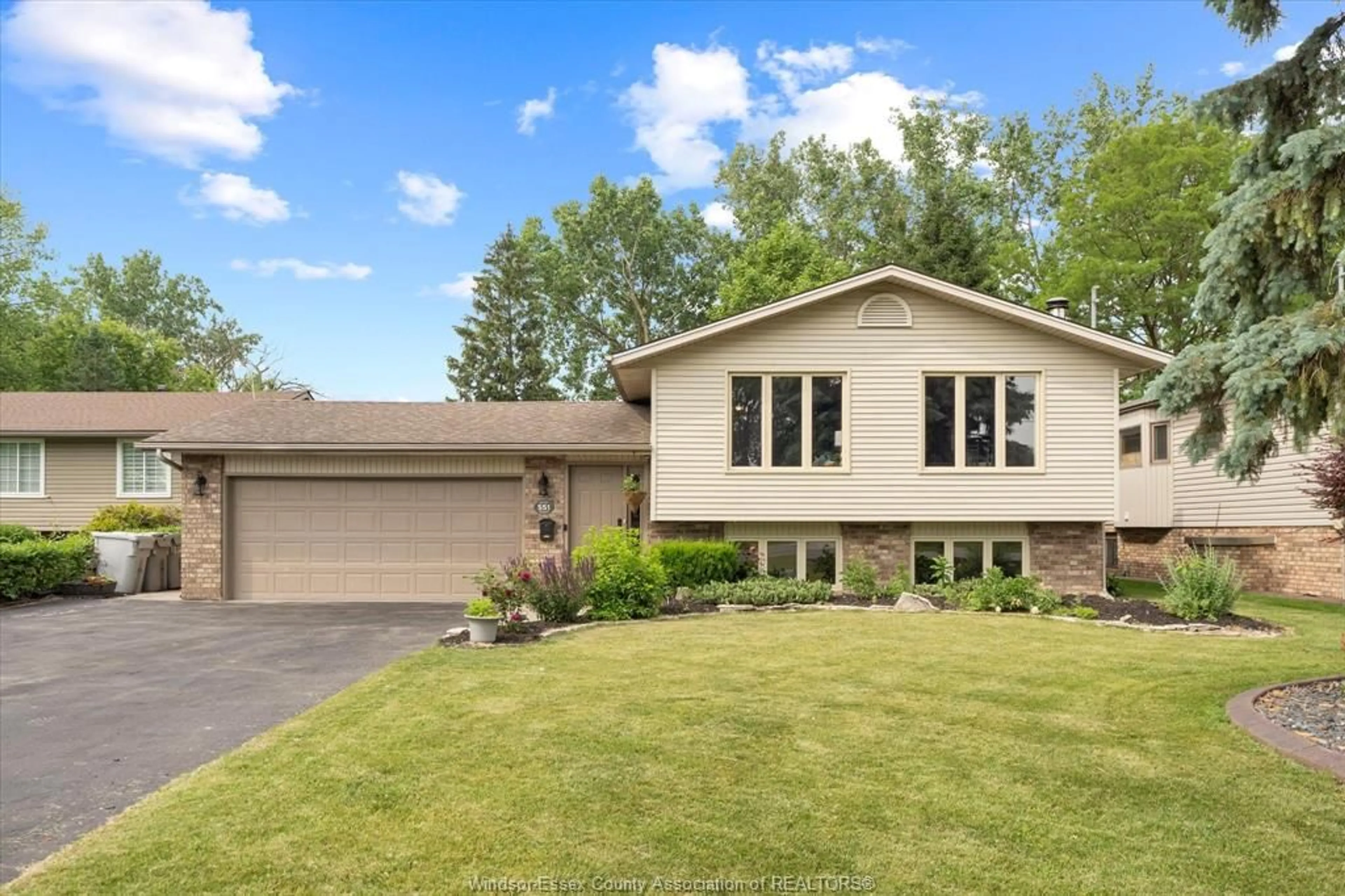 Home with vinyl exterior material, street for 551 REAUME Rd, LaSalle Ontario N9J 1B3