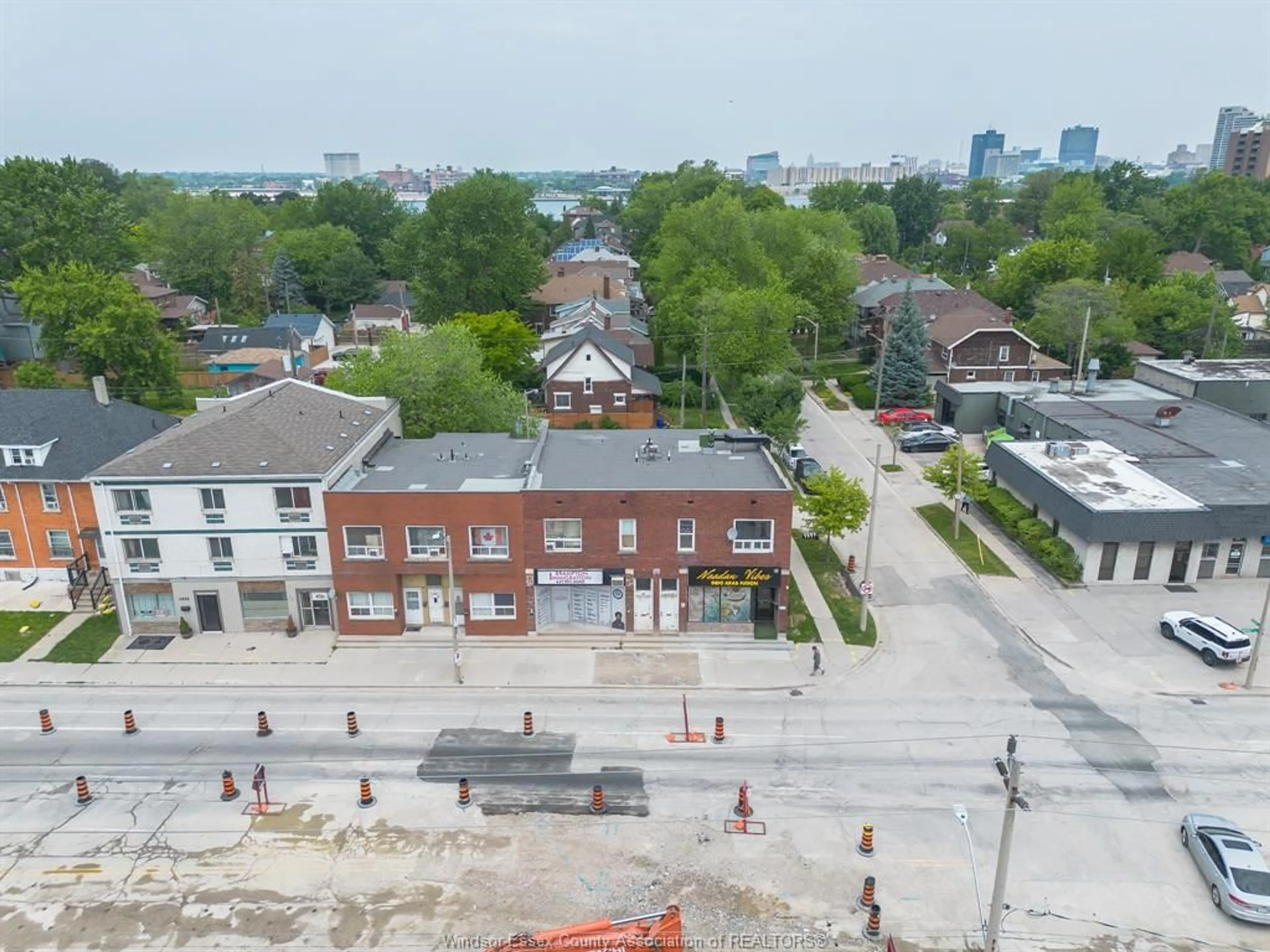 A pic from outside/outdoor area/front of a property/back of a property/a pic from drone, city buildings view from balcony for 1802-1820 UNIVERSITY Ave, Windsor Ontario N9B 1C2