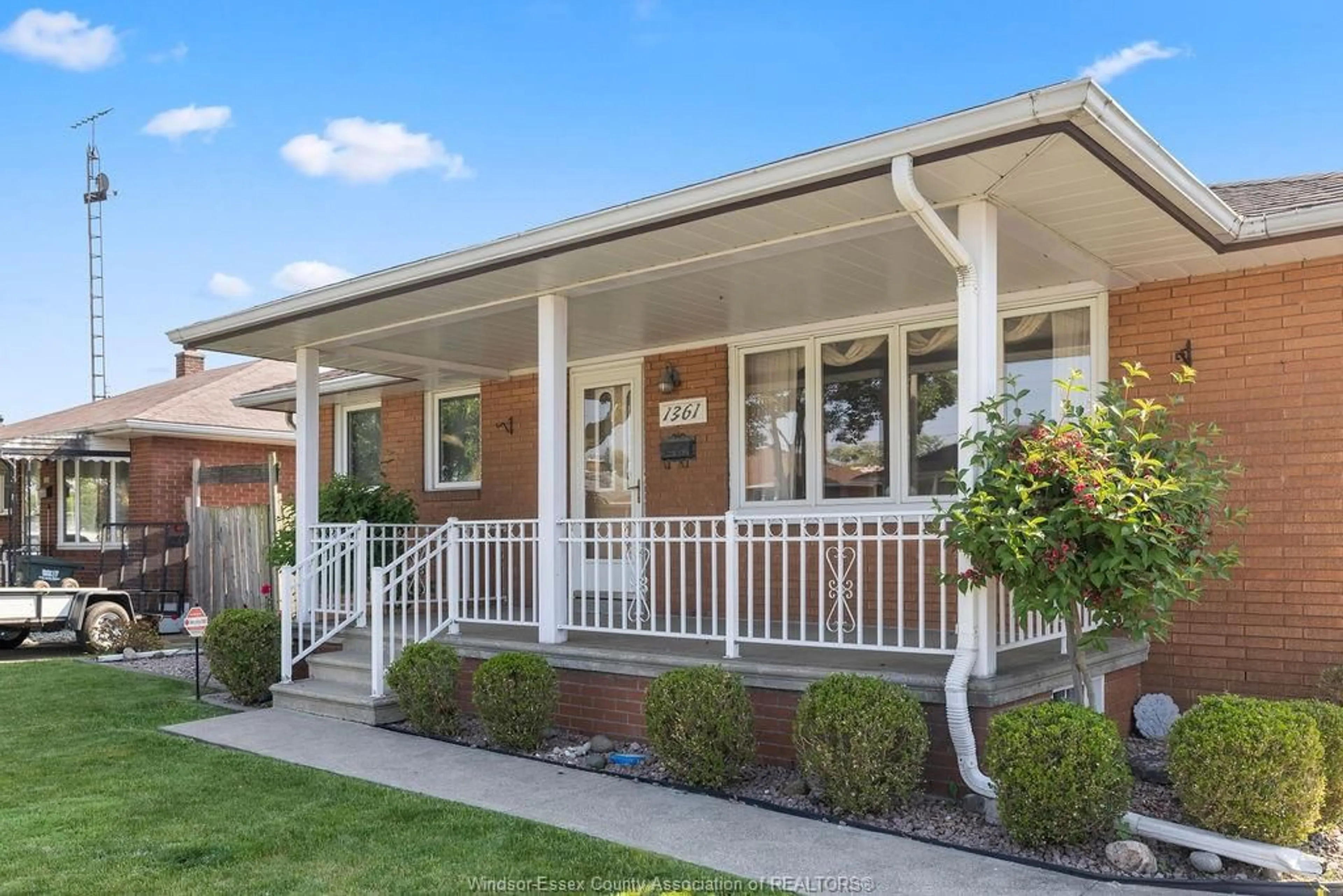 Home with vinyl exterior material, street for 1361 BRIDGE Ave, Windsor Ontario N9B 2N2