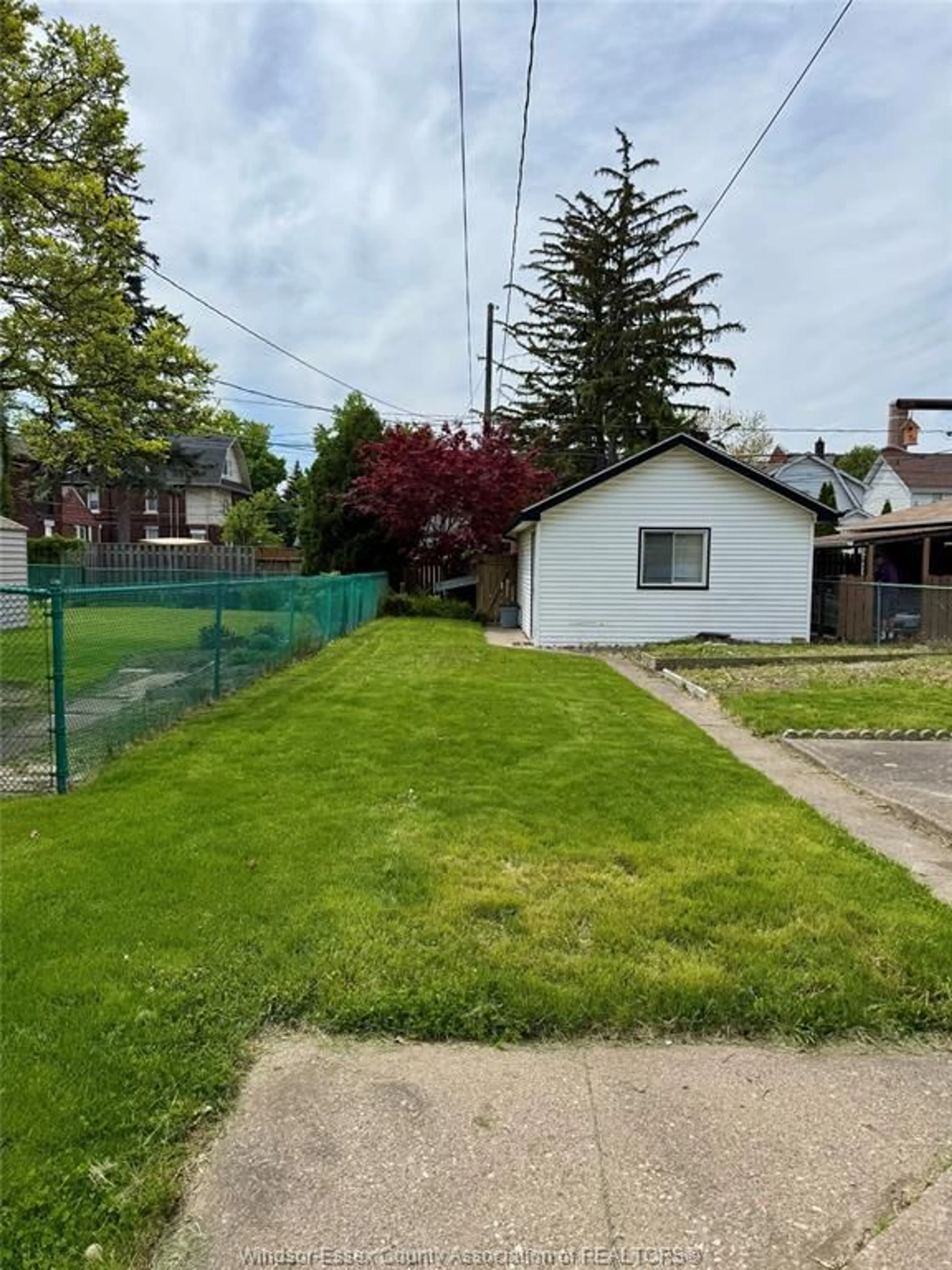 A pic from outside/outdoor area/front of a property/back of a property/a pic from drone, street for 1185 LANGLOIS Ave, Windsor Ontario N9A 2H4