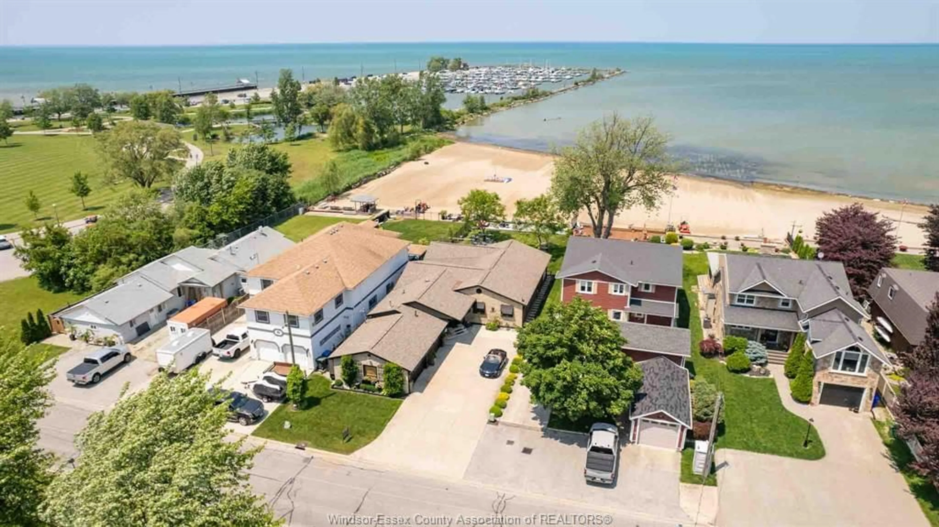 A pic from outside/outdoor area/front of a property/back of a property/a pic from drone, water/lake/river/ocean view for 519 LAKEVIEW Dr, Belle River Ontario N0R 1A0