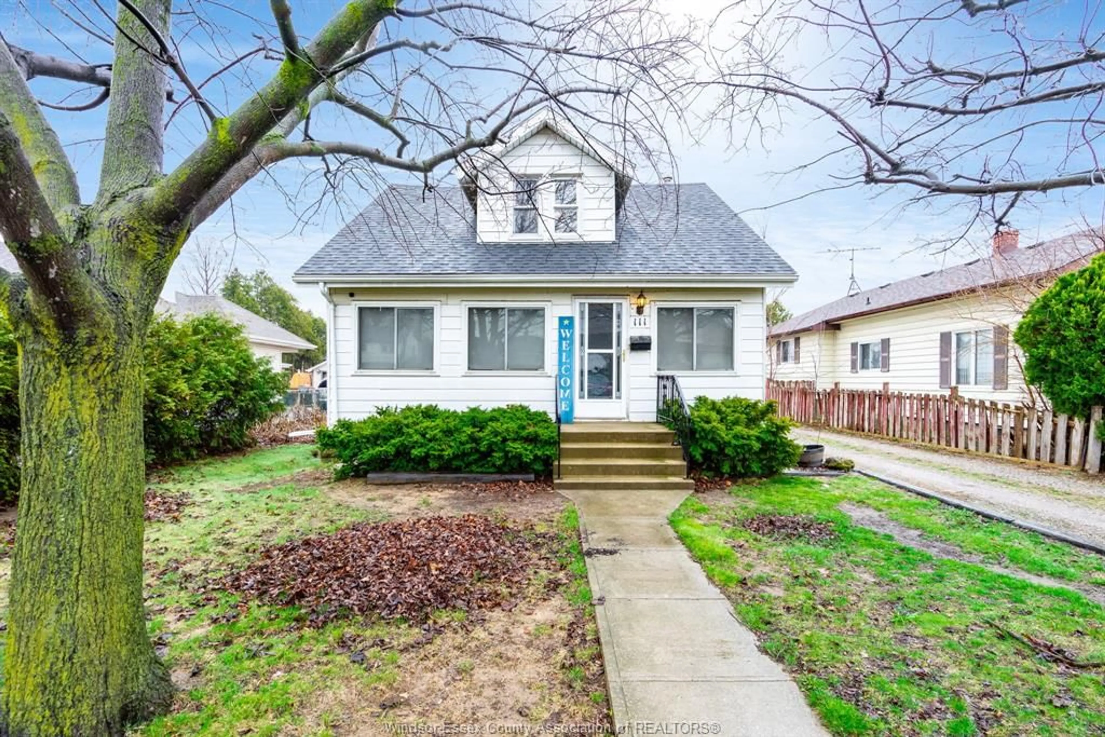 Home with vinyl exterior material, street for 111 ELLIOTT St, Leamington Ontario N8H 3M9