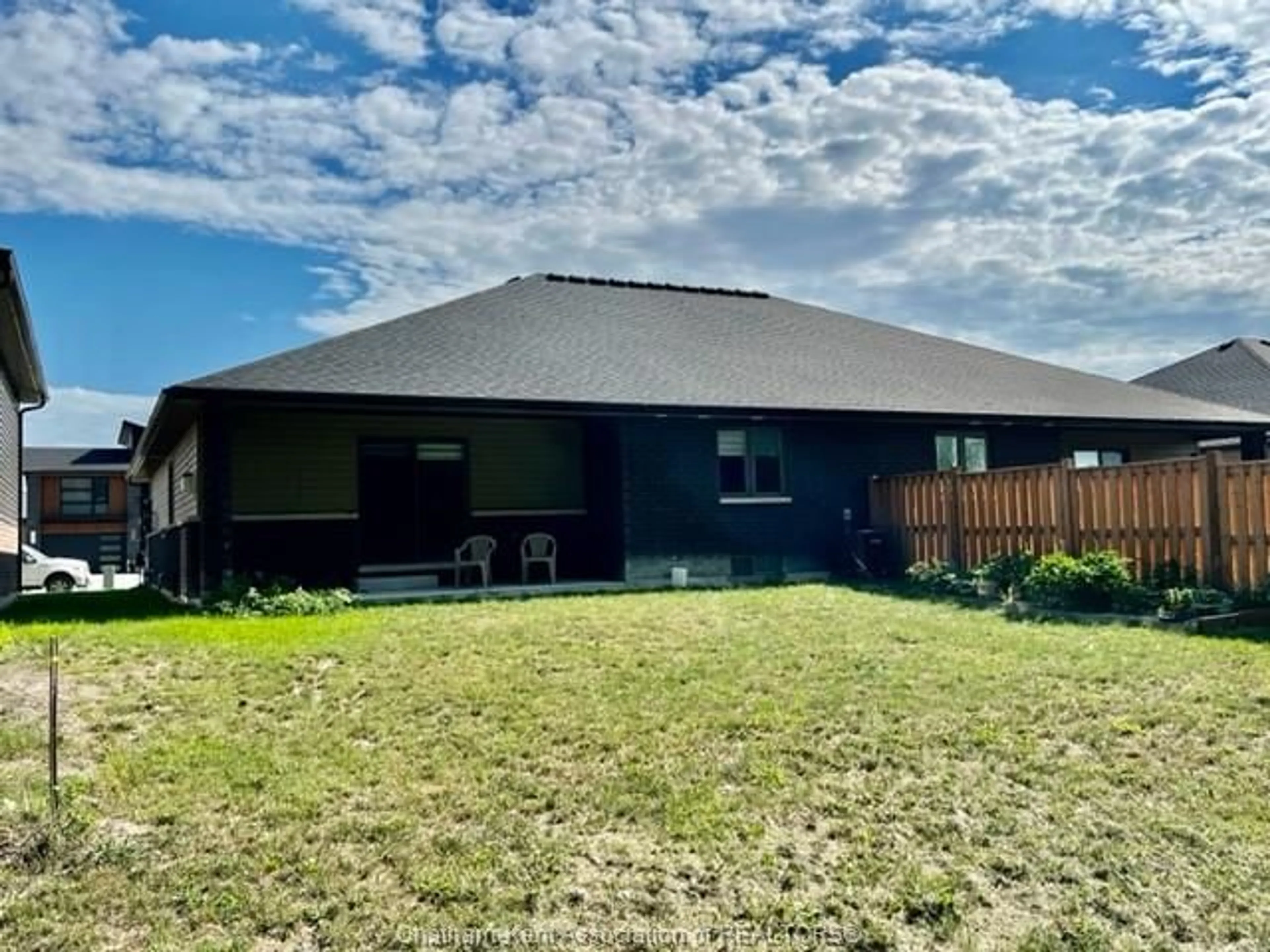 A pic from outside/outdoor area/front of a property/back of a property/a pic from drone, unknown for 44 Churchill Park Rd, Chatham Ontario N7M 0R8