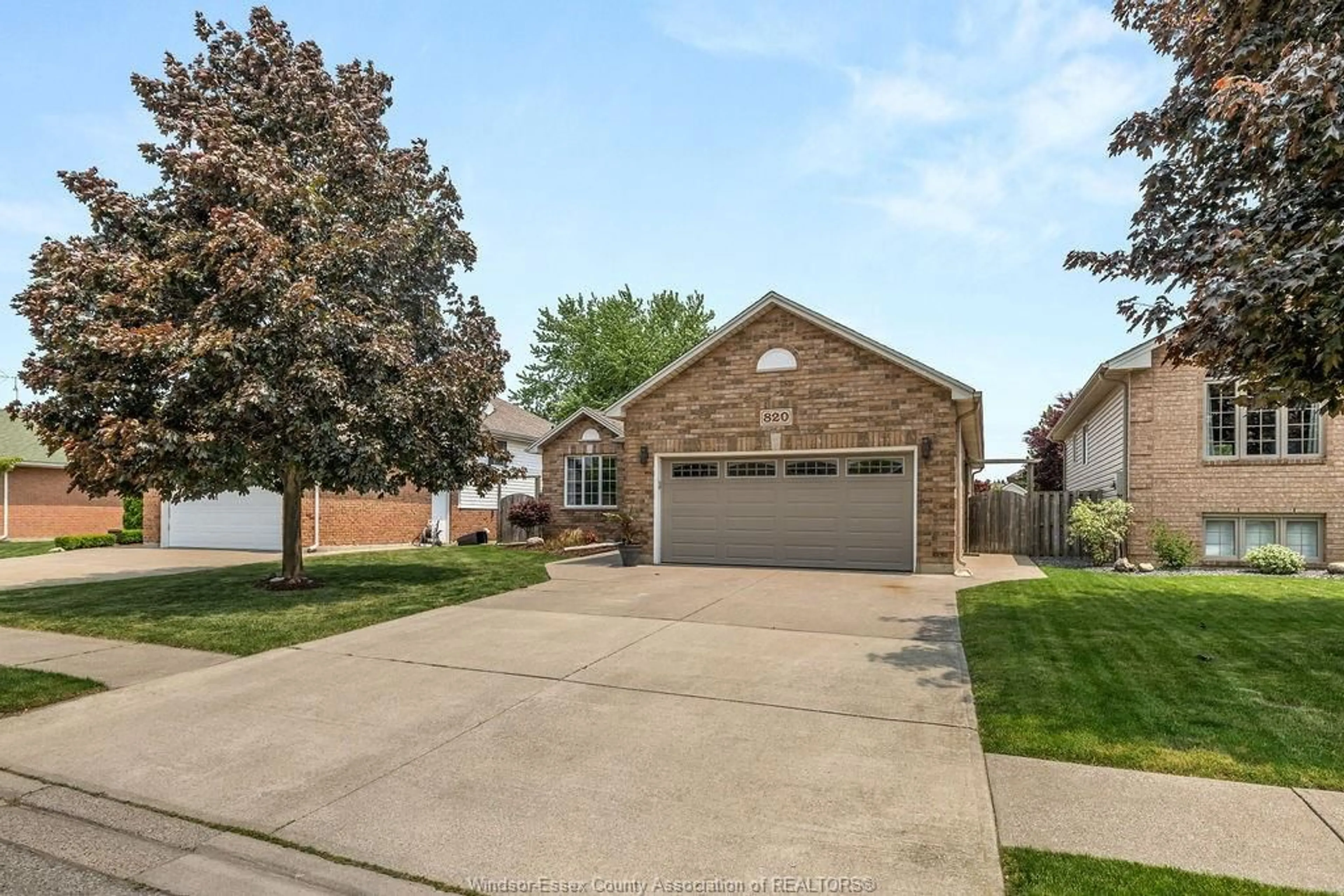 Home with brick exterior material, street for 820 REVLAND Dr, Tecumseh Ontario N8N 5B2