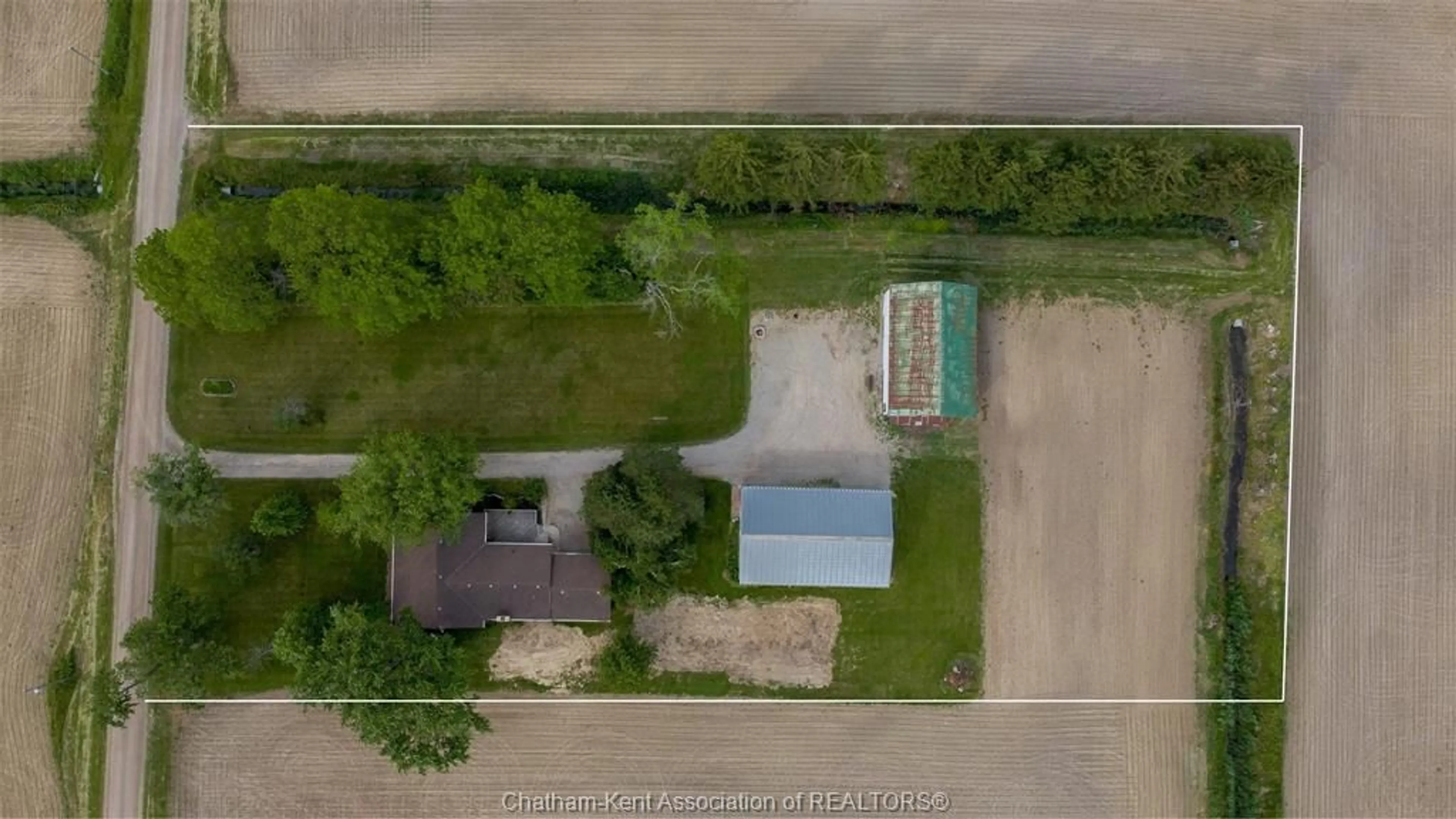 A pic from outside/outdoor area/front of a property/back of a property/a pic from drone, unknown for 12567 BLOCK Line, Thamesville Ontario N0P 2K0