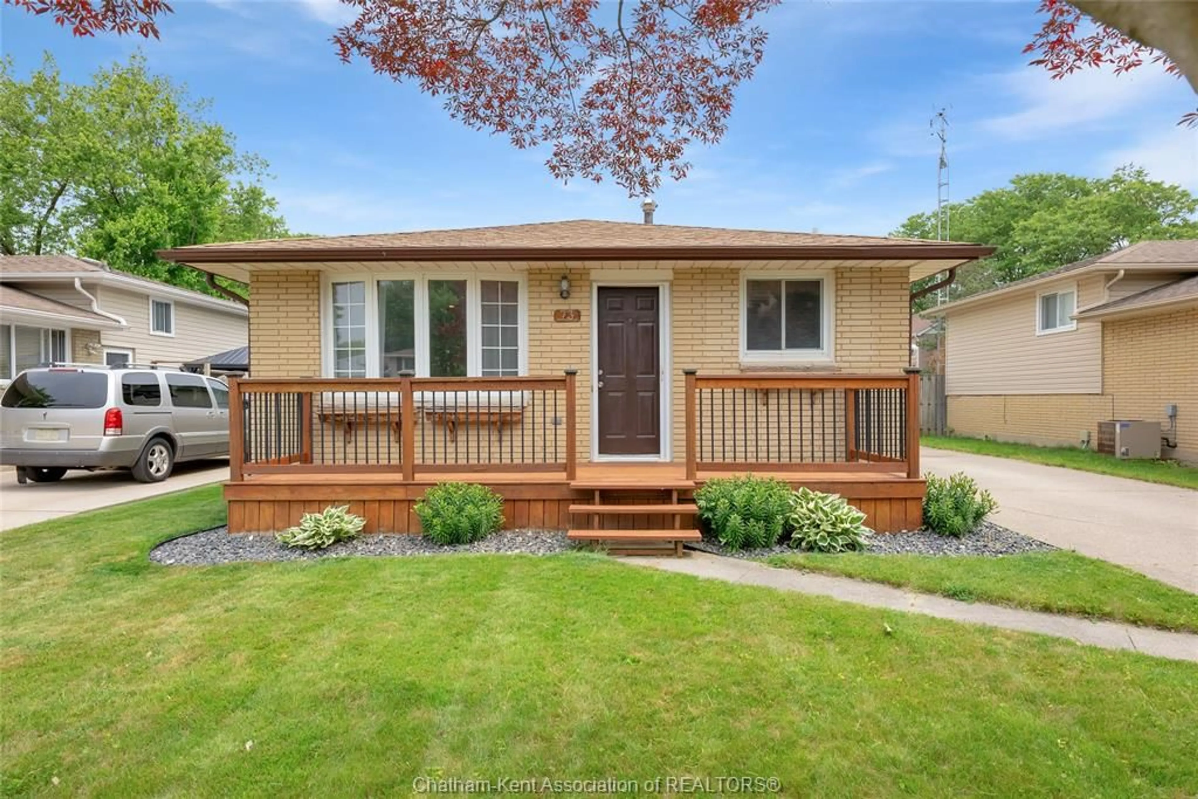 Home with vinyl exterior material, street for 73 MARION Ave, Chatham Ontario N7M 5N7