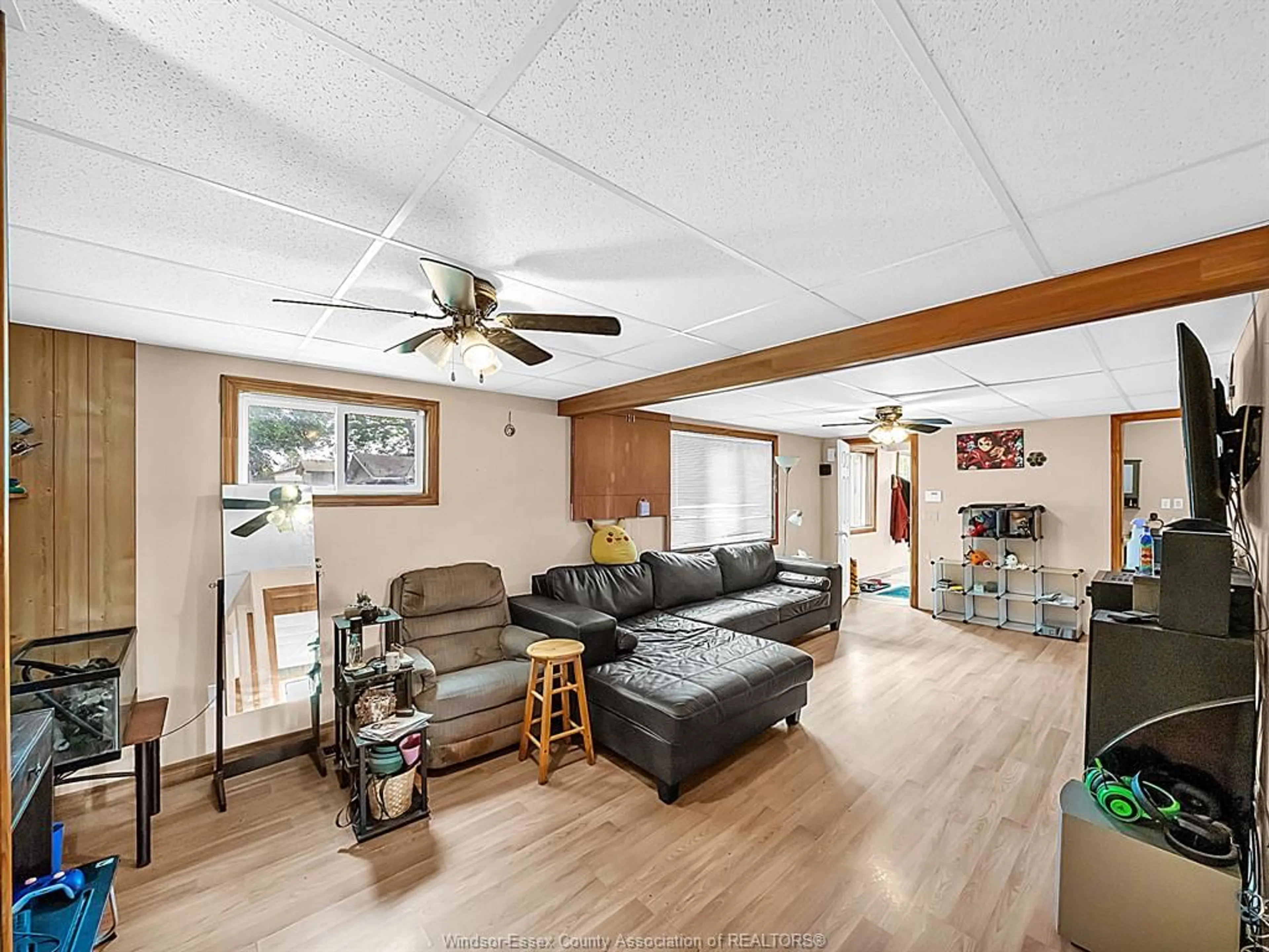 Living room with furniture, wood/laminate floor for 909 BUSHEY St, Stoney Point Ontario N0R 1N0
