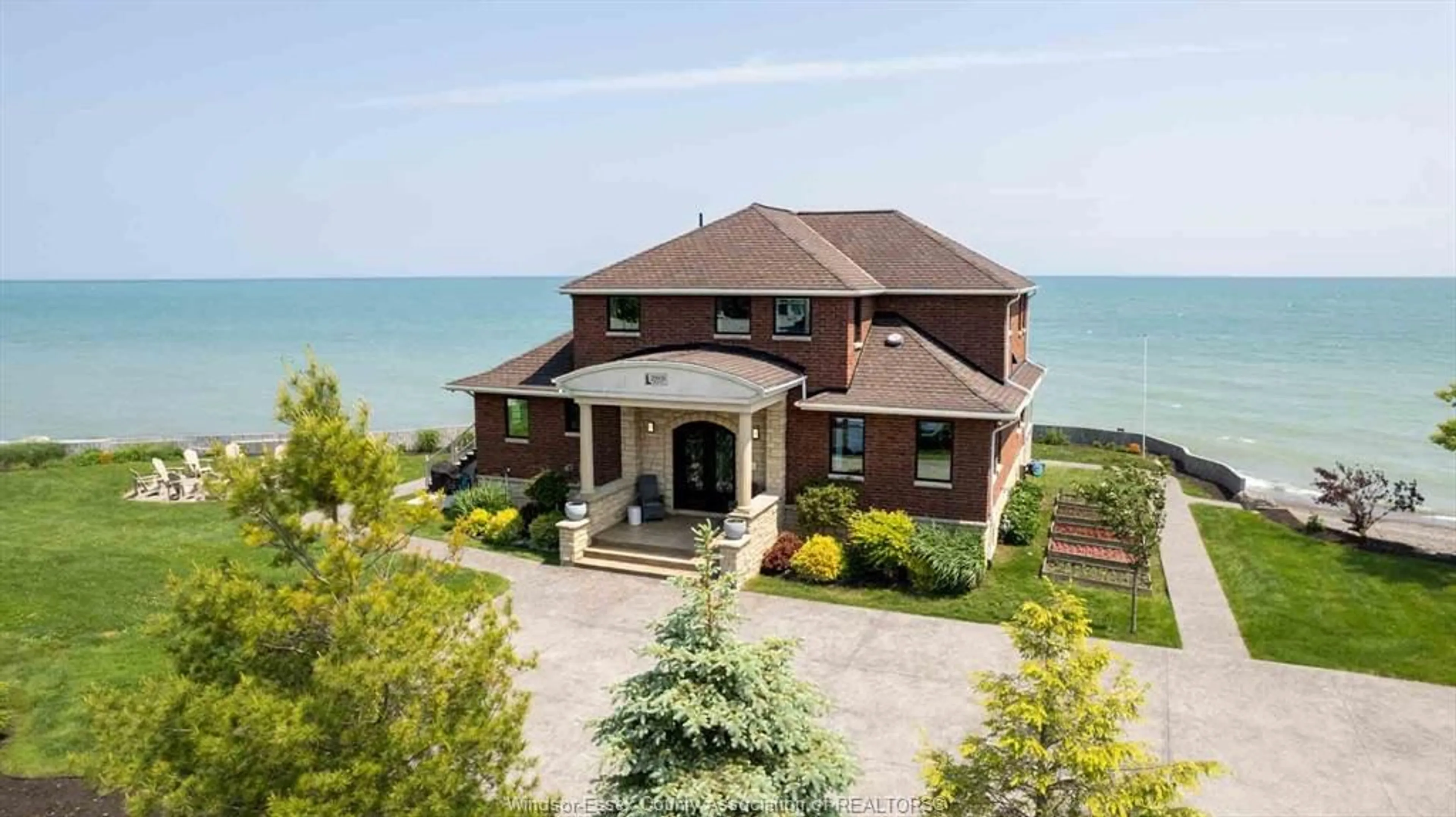 A pic from outside/outdoor area/front of a property/back of a property/a pic from drone, water/lake/river/ocean view for 20939 HICKORY, Wheatley Ontario N0P 2P0