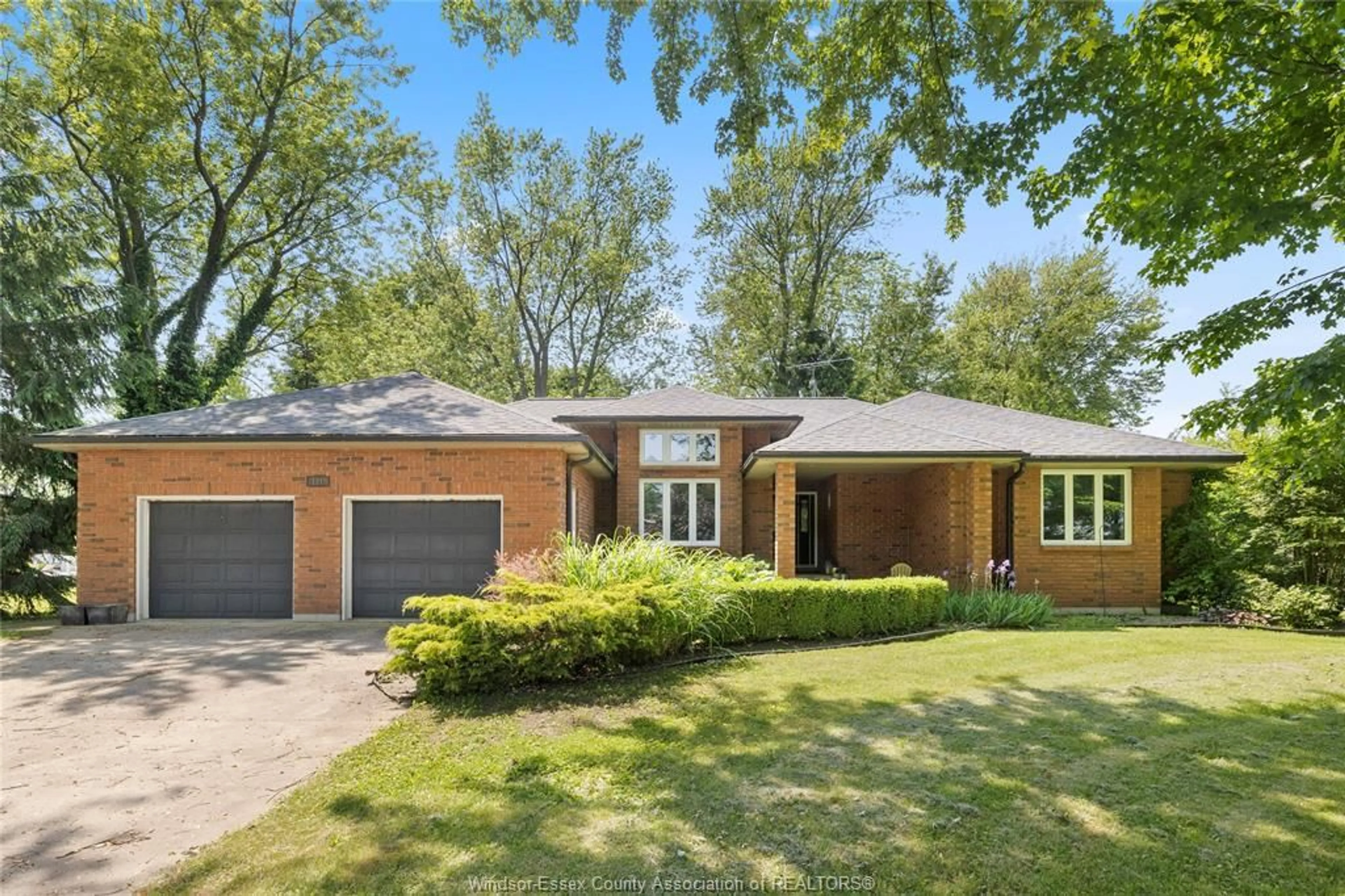 Home with brick exterior material, street for 121 PARK St, Essex Ontario N0R 1G0