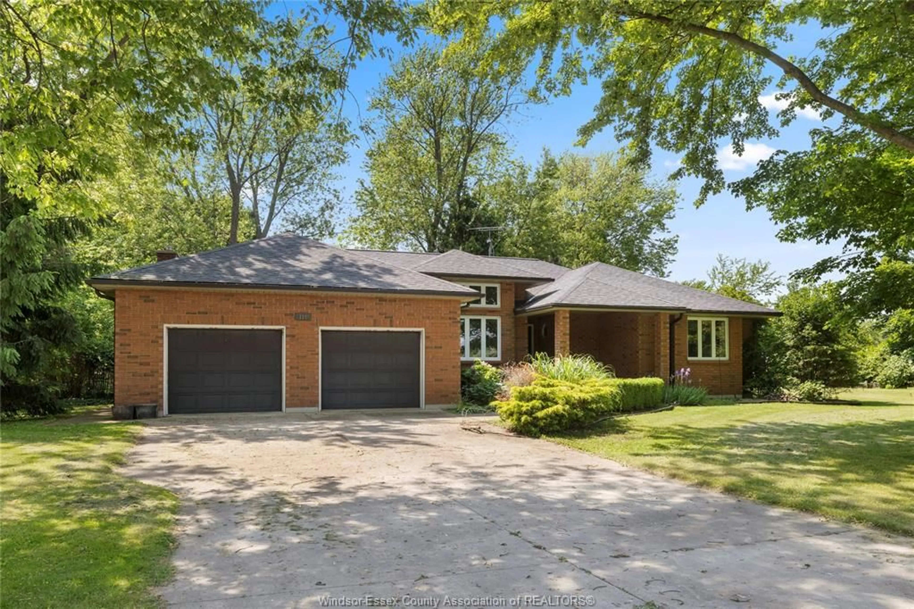 Home with brick exterior material, street for 121 PARK St, Essex Ontario N0R 1G0