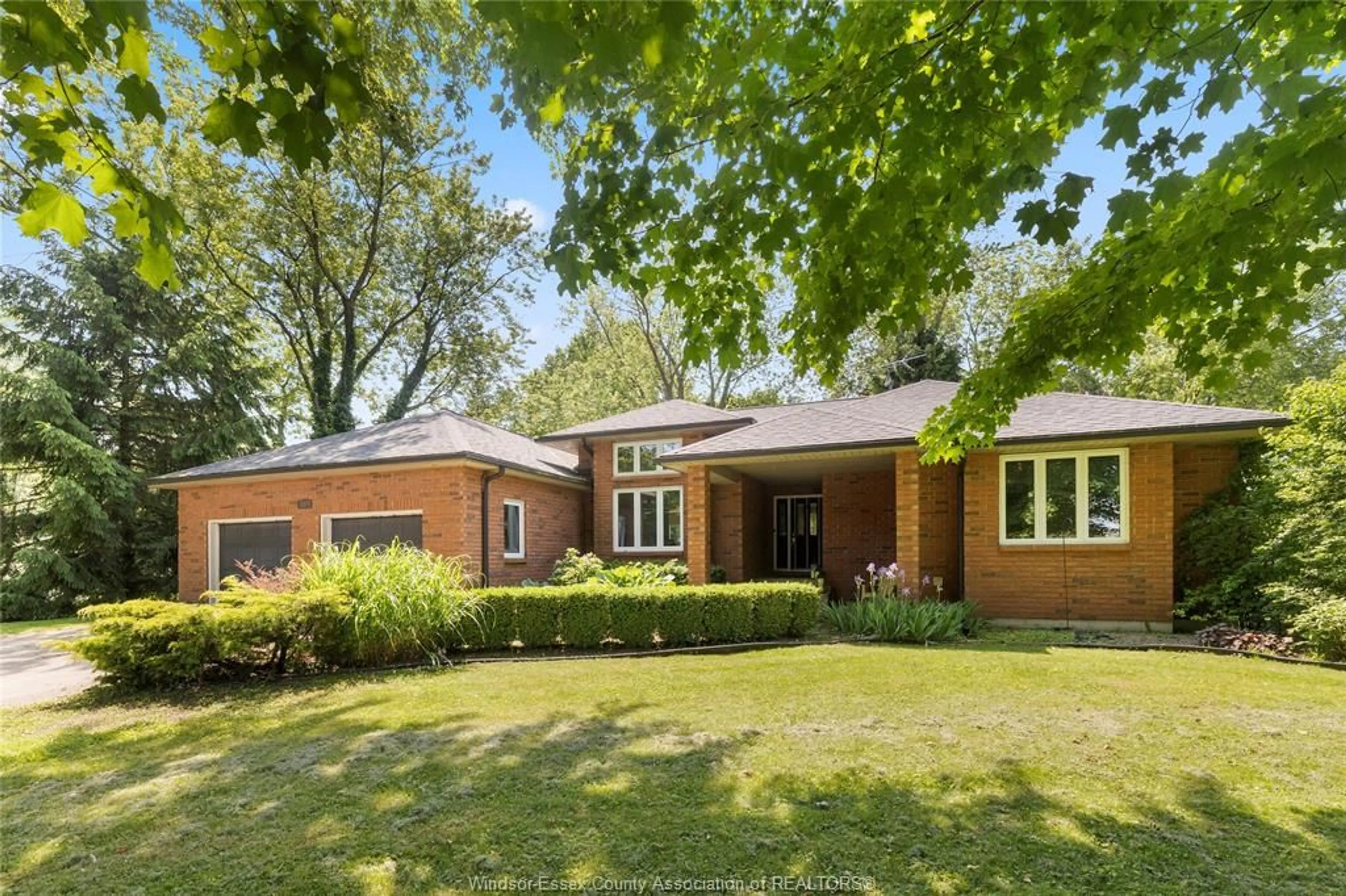 Home with brick exterior material, street for 121 PARK St, Essex Ontario N0R 1G0