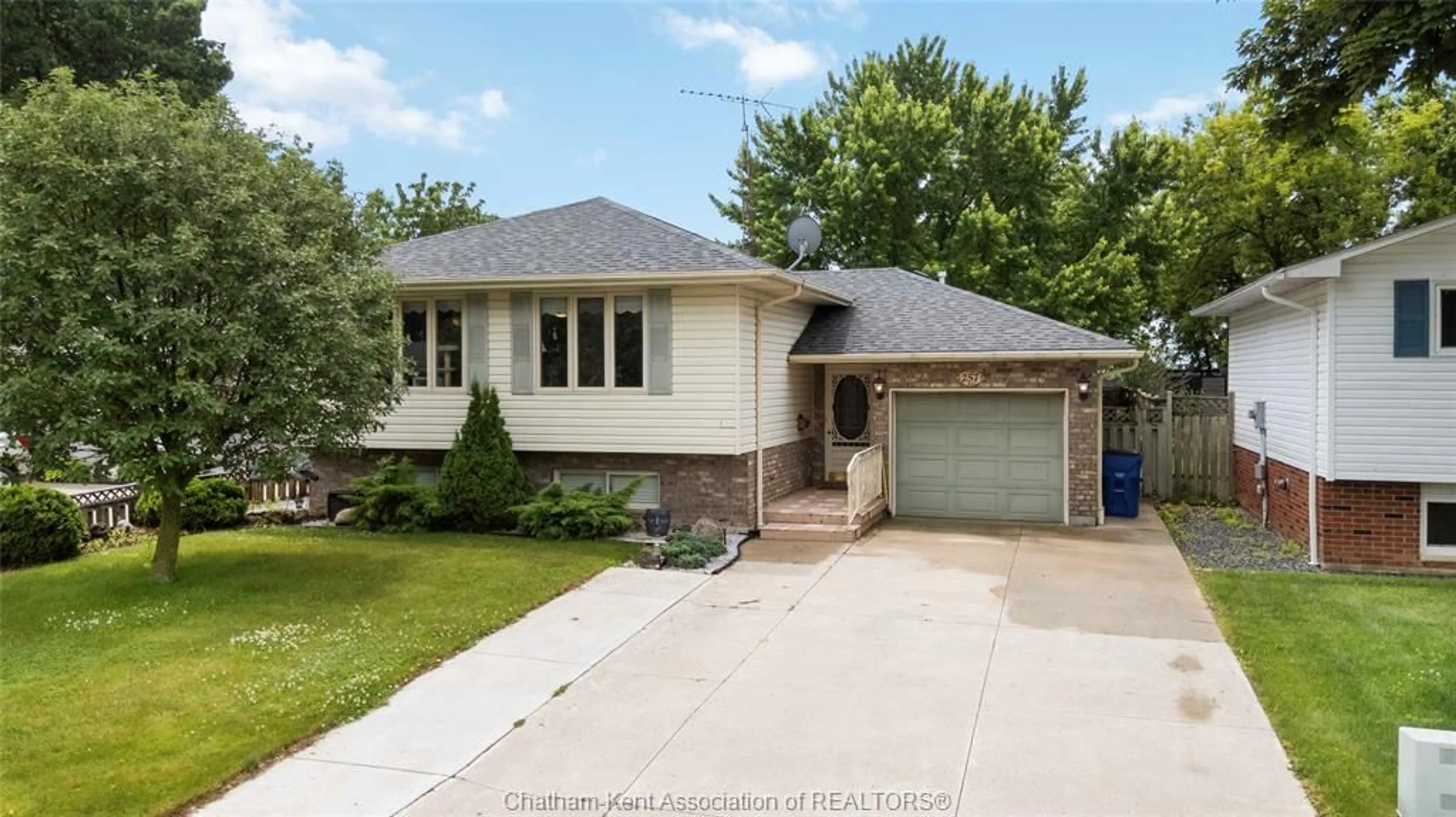Home with brick exterior material, street for 257 Hudson Cres, Wallaceburg Ontario N8A 5B1