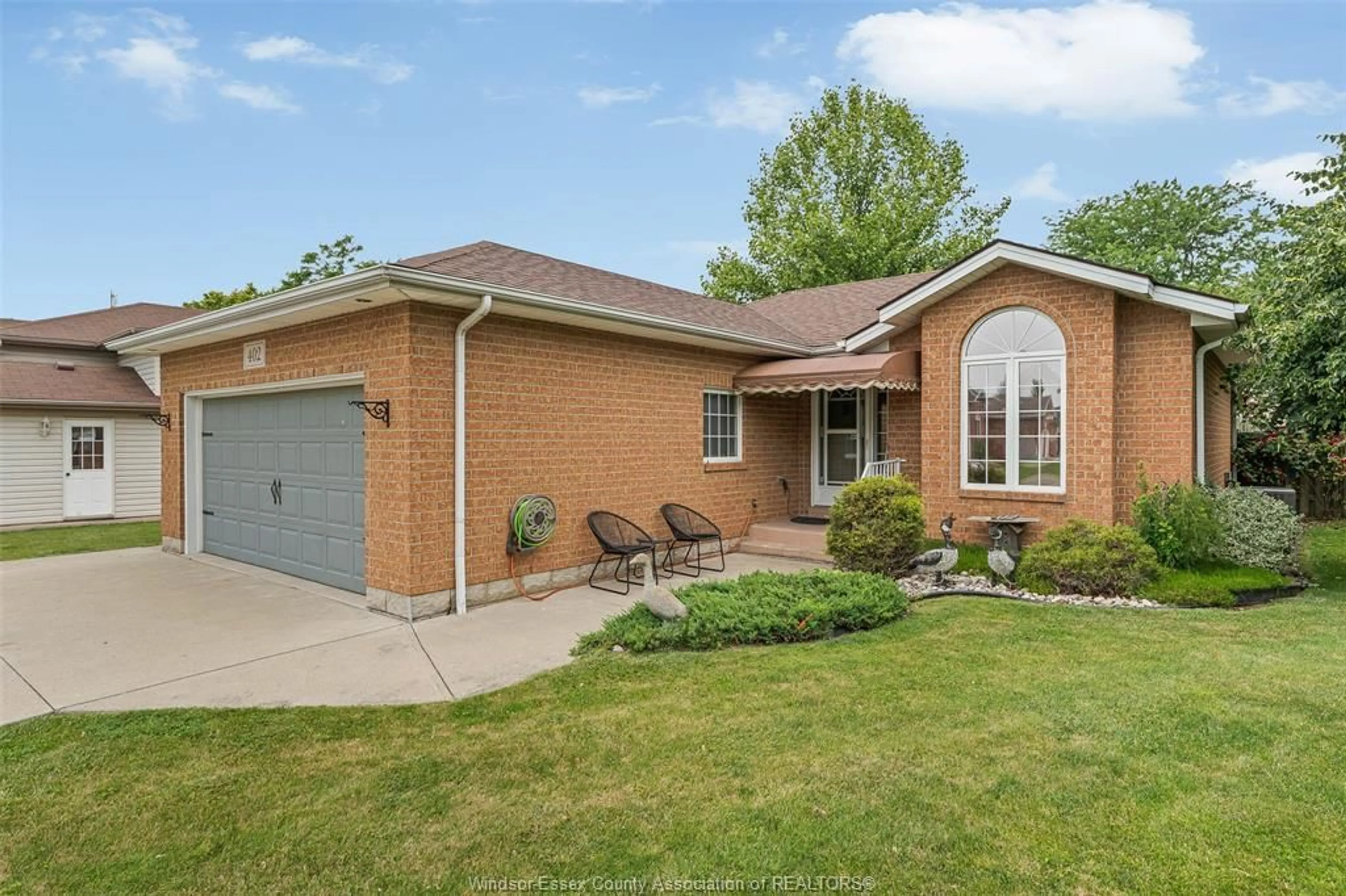 Home with brick exterior material, street for 402 THORNRIDGE Cres, Amherstburg Ontario N9V 3X2