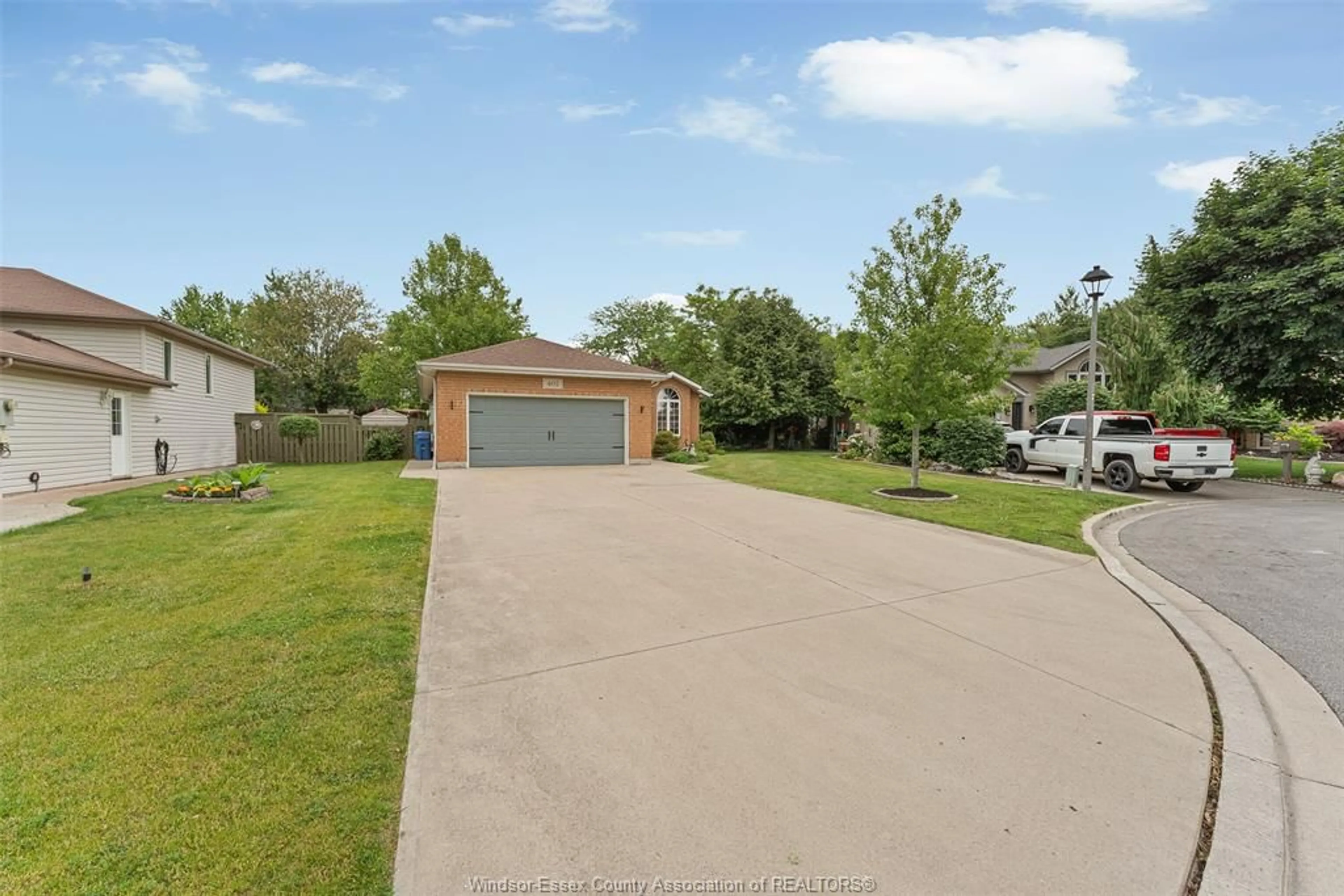 A pic from outside/outdoor area/front of a property/back of a property/a pic from drone, water/lake/river/ocean view for 402 THORNRIDGE Cres, Amherstburg Ontario N9V 3X2