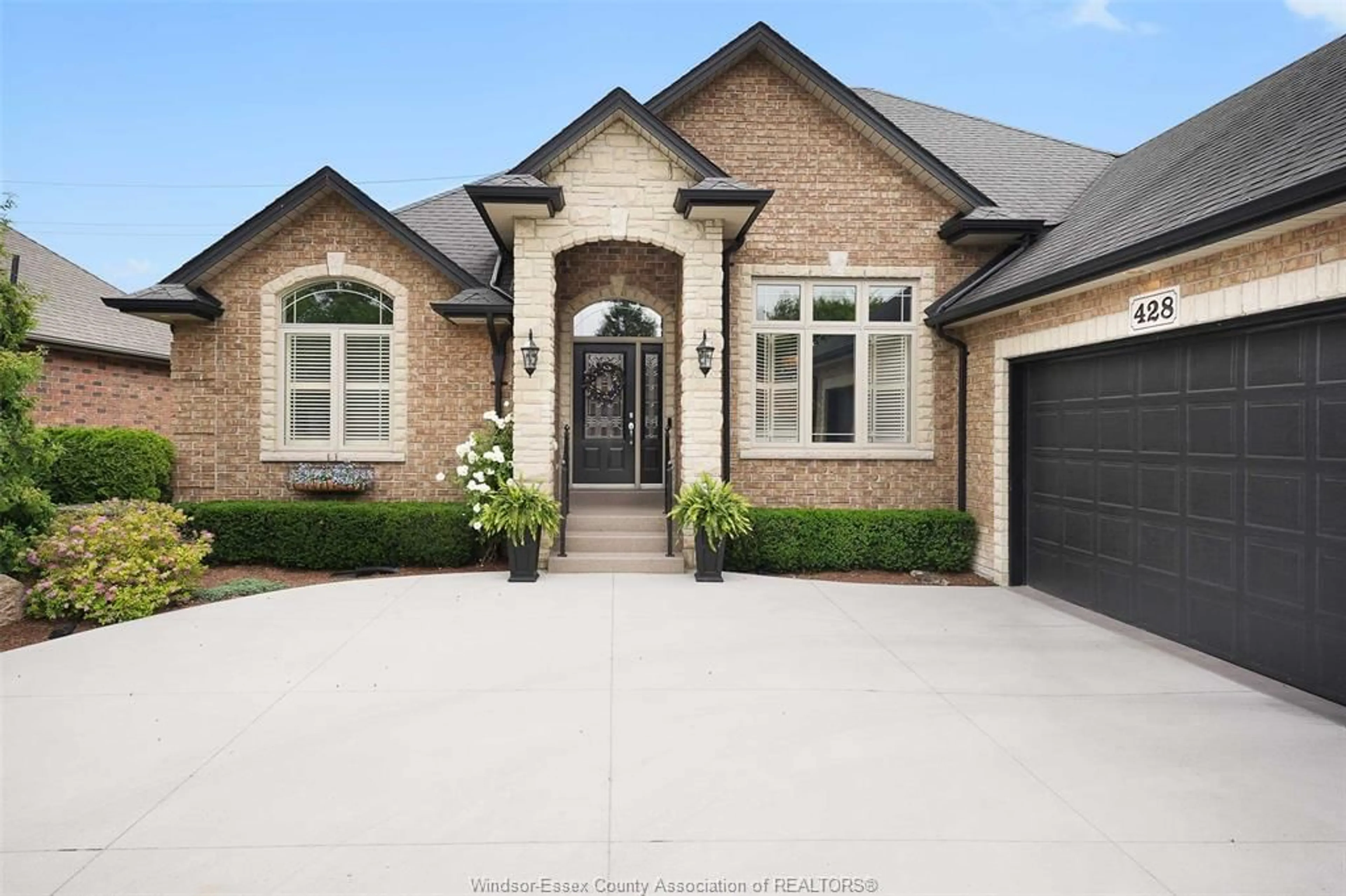 Home with brick exterior material, street for 428 MOUNTBATTEN Cres, Windsor Ontario N8P 1W4