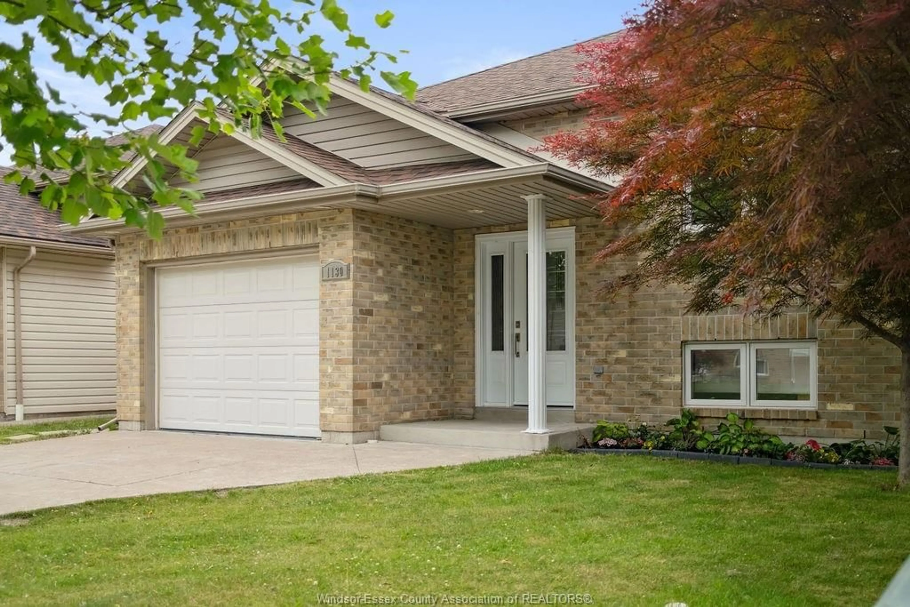 Home with brick exterior material, street for 1130 Pearson Ave, Windsor Ontario N8P 1X2