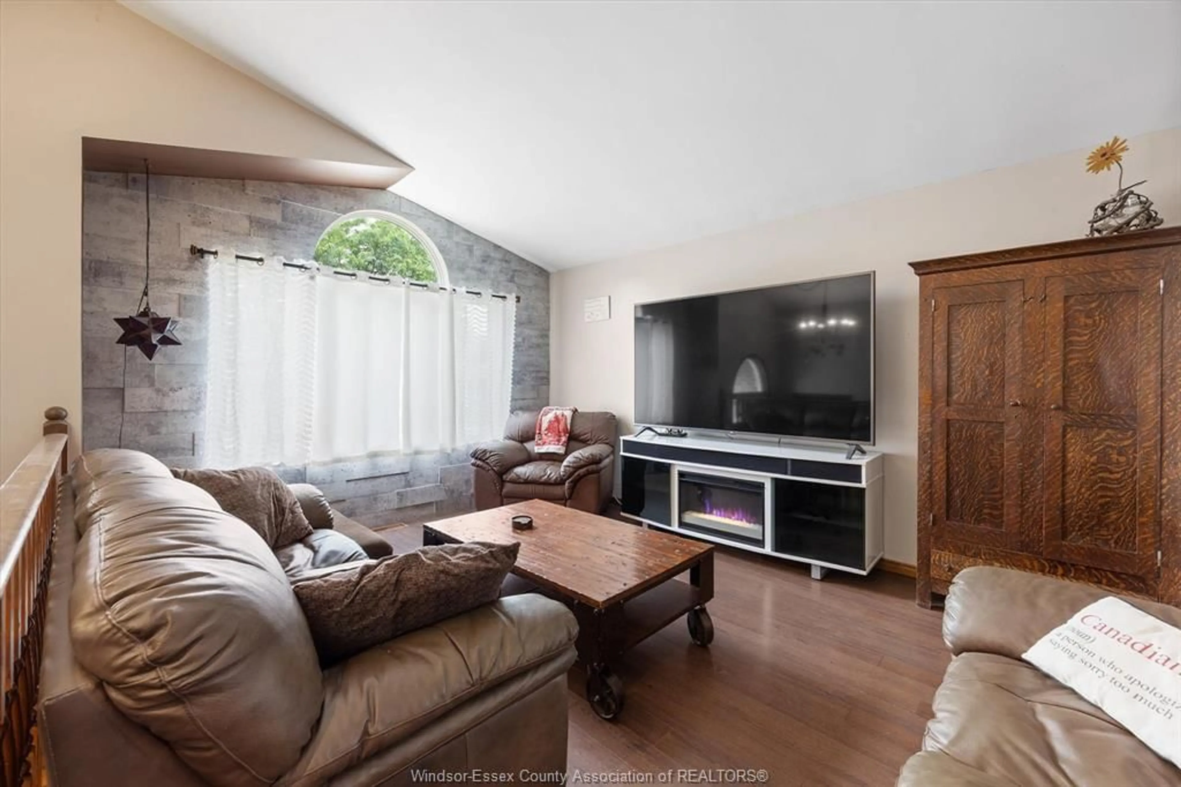 Living room with furniture, wood/laminate floor for 4758 THERESA Trail, Windsor Ontario N8T 3M8