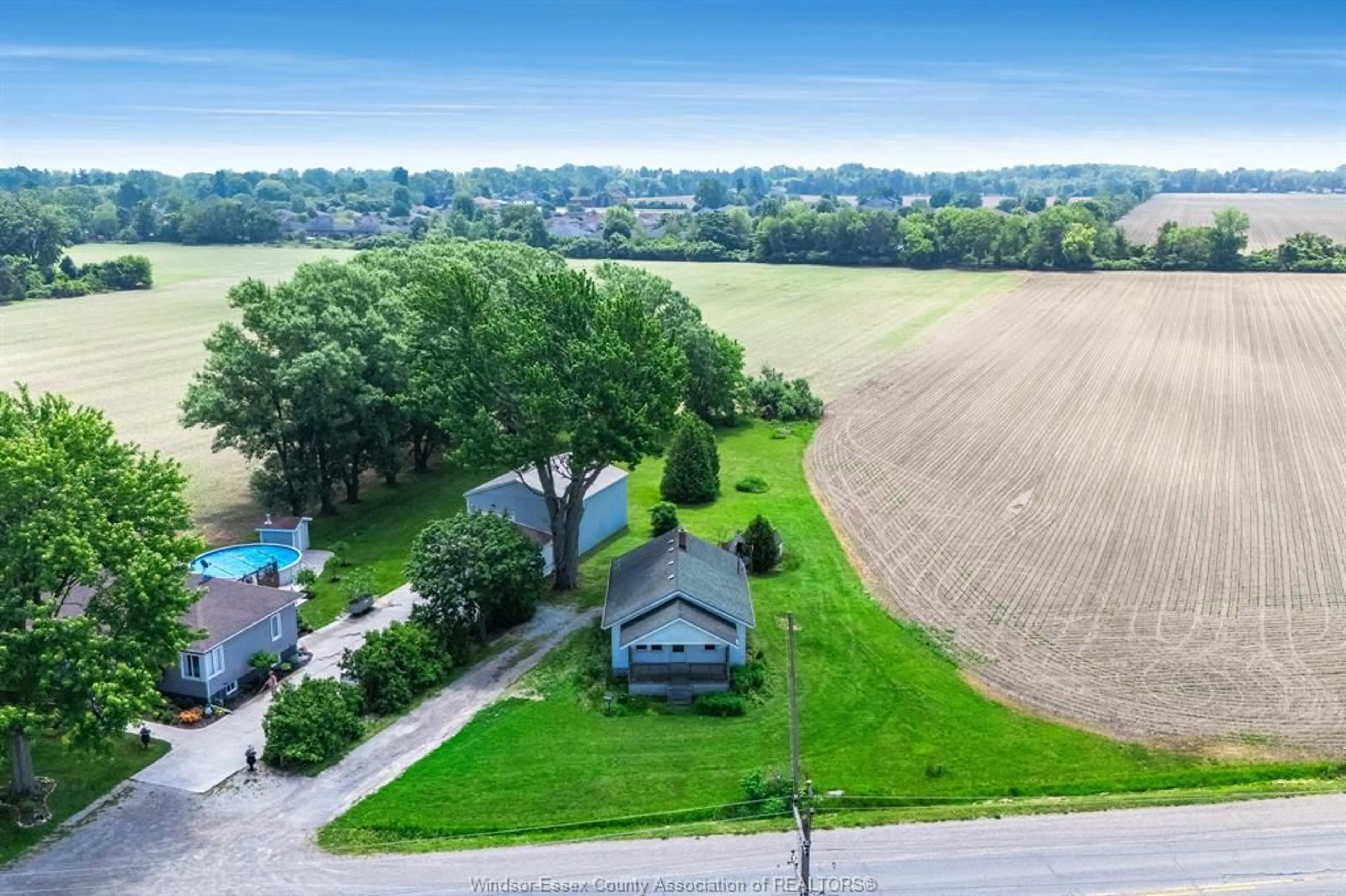 A pic from outside/outdoor area/front of a property/back of a property/a pic from drone, water/lake/river/ocean view for 389 County Rd 20, Kingsville Ontario N9Y 4B9