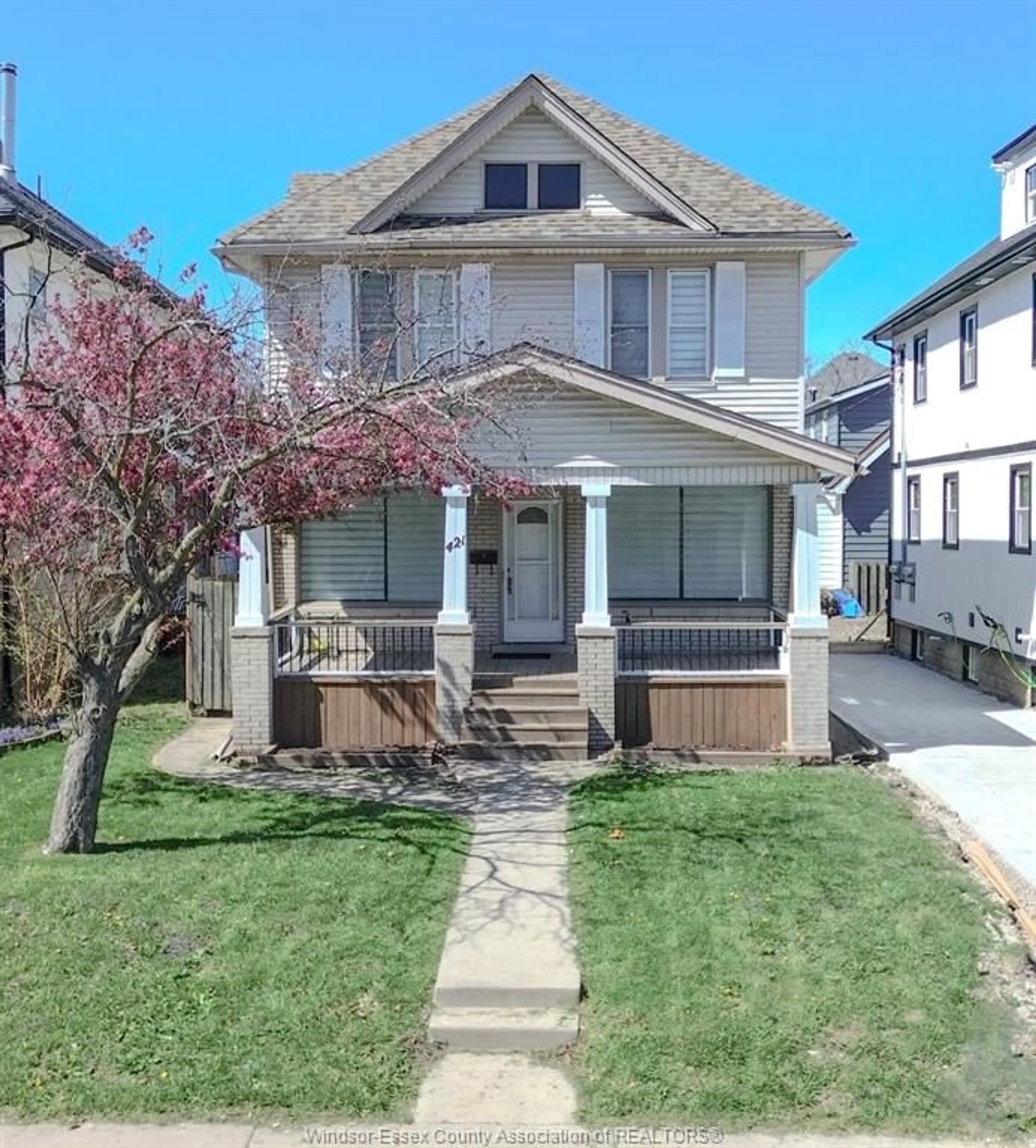 Home with vinyl exterior material, street for 421 HALL Ave, Windsor Ontario N9A 2L7